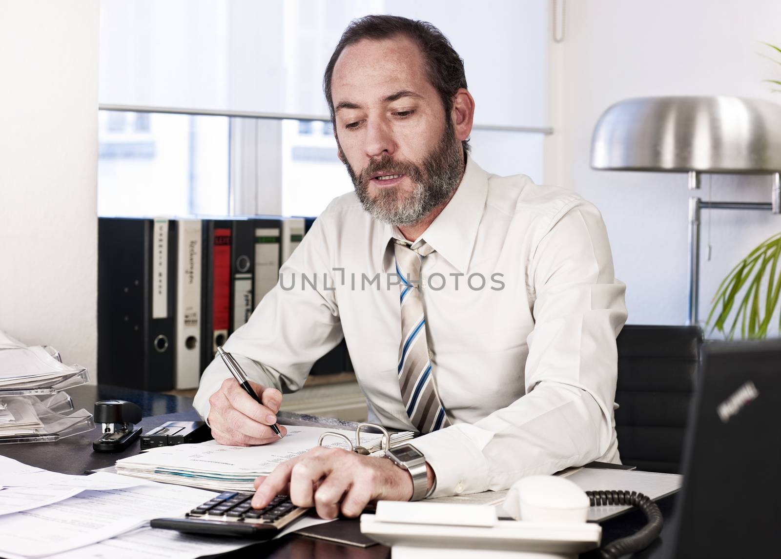 Businessman calculating finance by aa-w