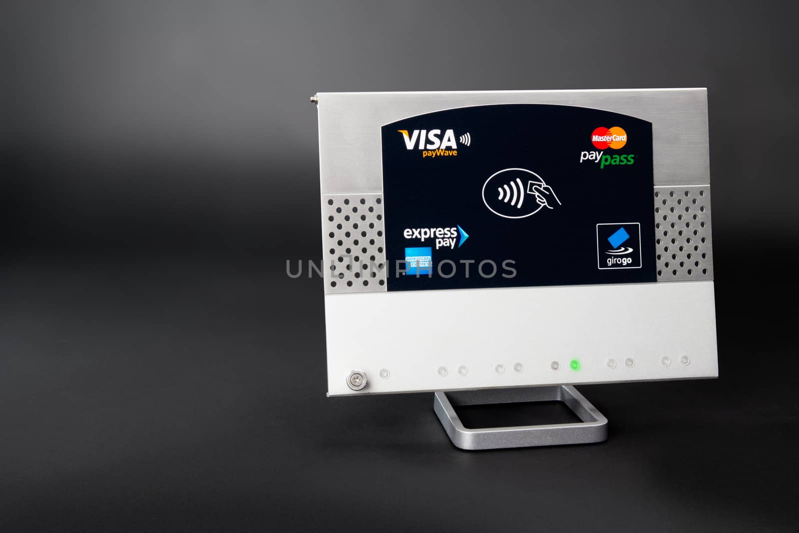 Aachen, Germany - August 05, 2012: Studioshot of a NFC terminal wich accepts visa, mastercard, american express and girogo contactless payments.