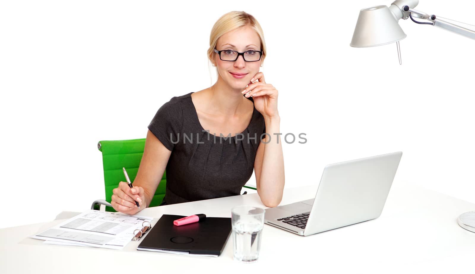 Young Business woman is smiling while working at workdesk