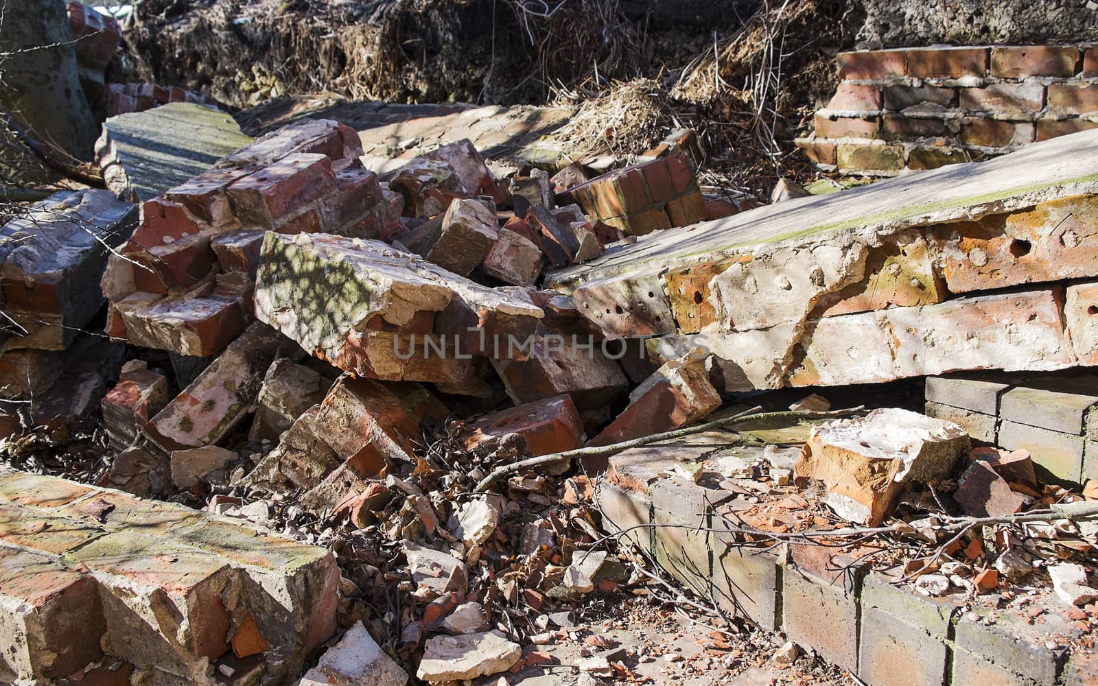 remains of collapsed brick wall