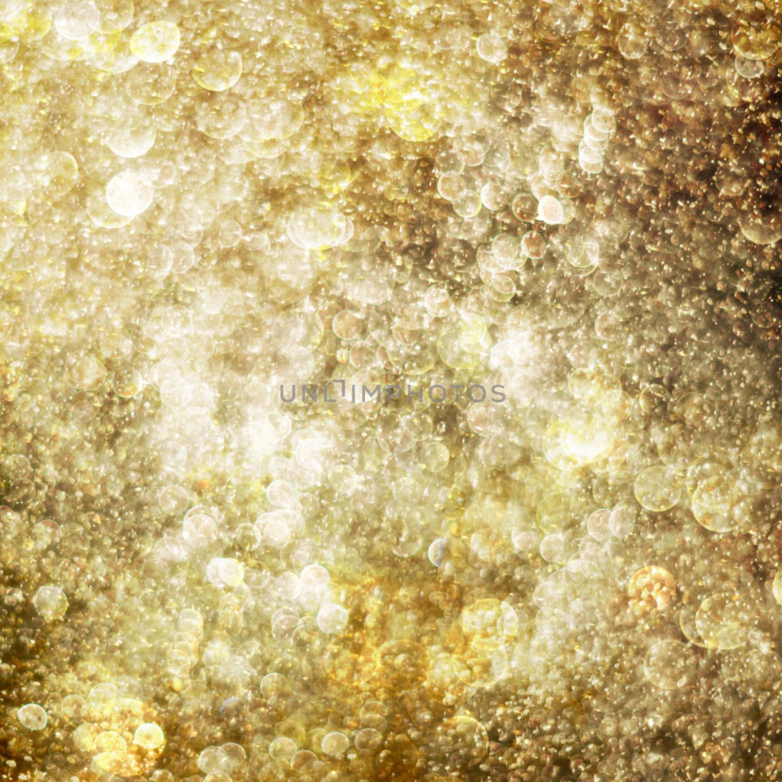 Golden abstract background with bokeh circles