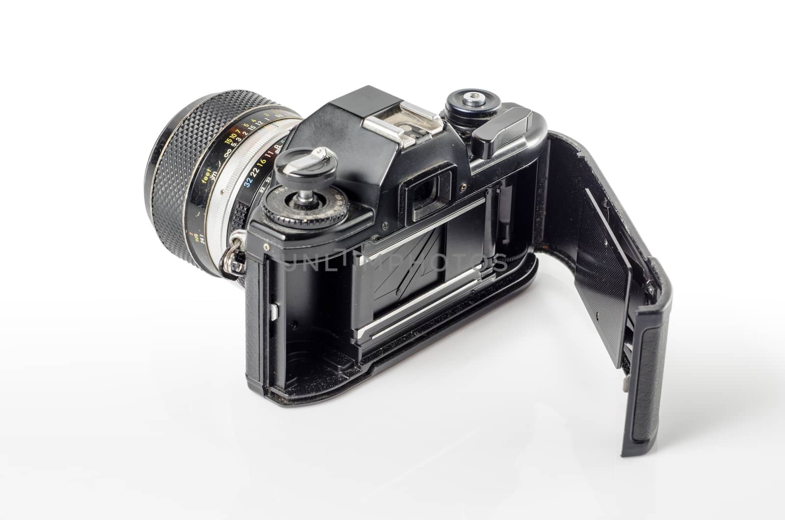 Inside view of a film photo camera  isolated on white :Clipping path included   by 9george