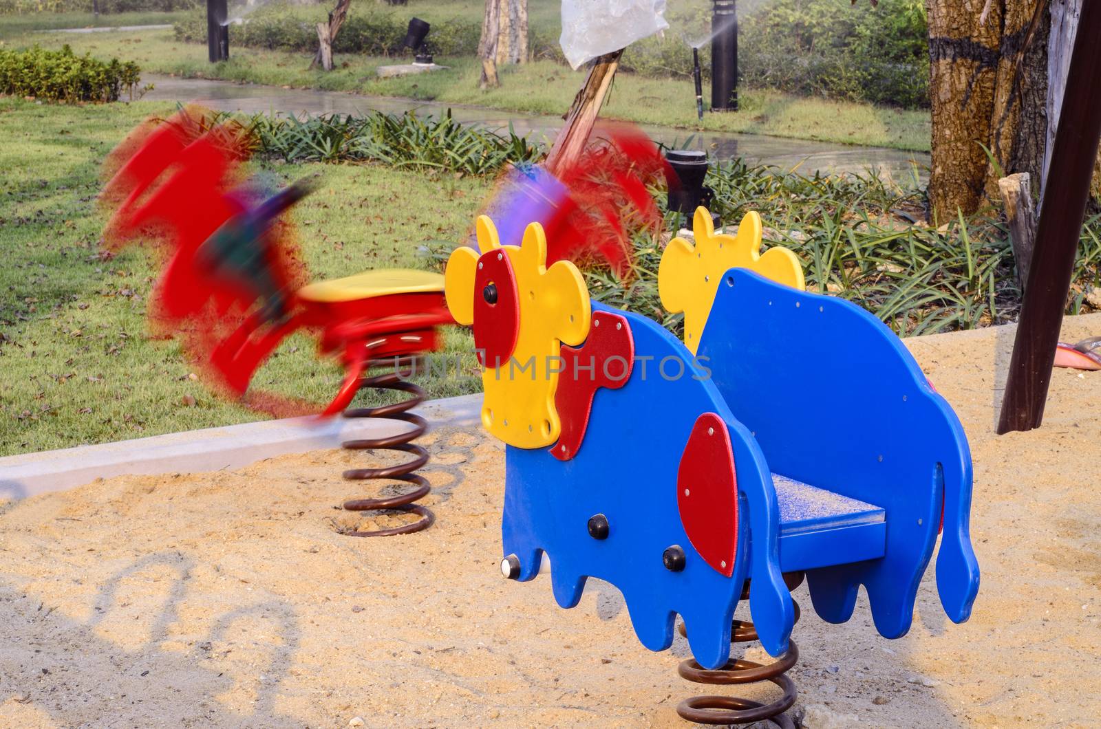 Empty children playground at the park : spring toy