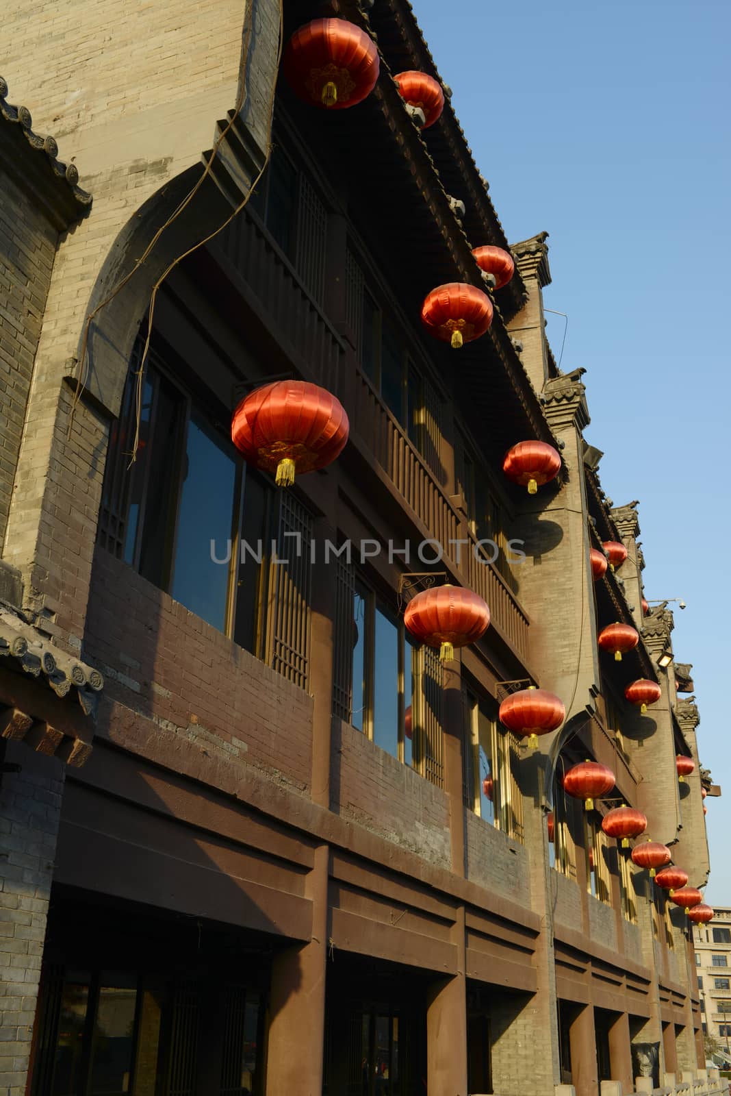 Chinese ancient buildings with red lamps at the city center of Xian, China