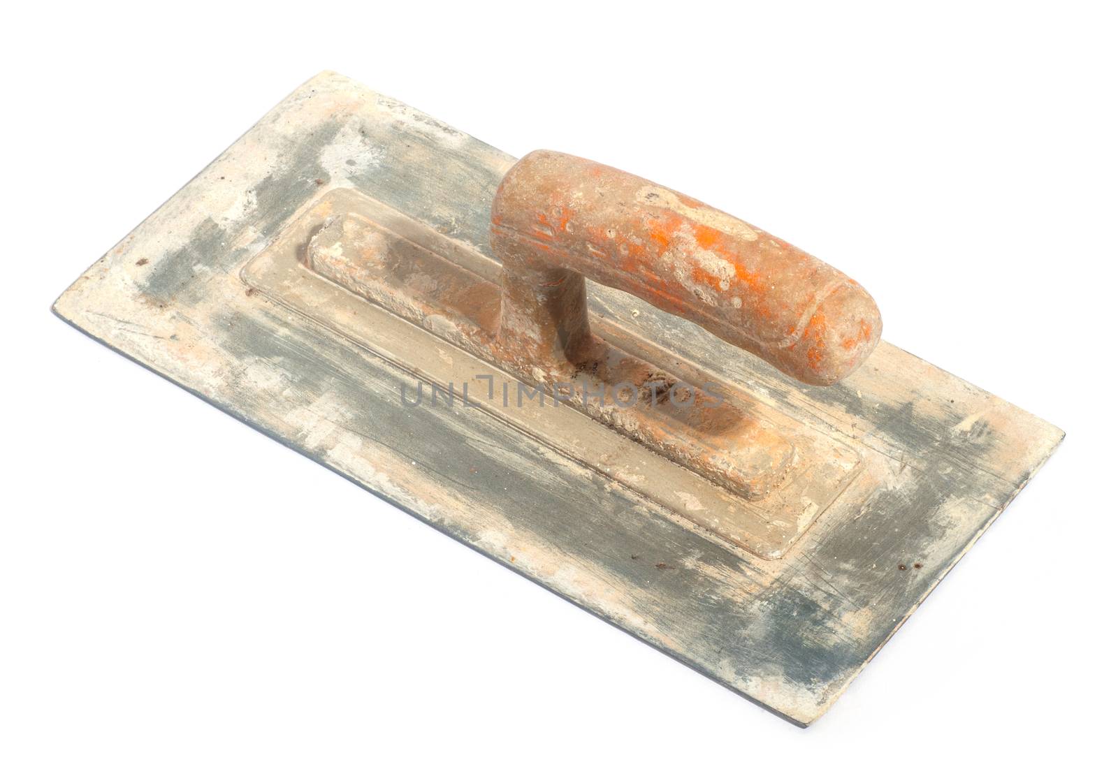 Close up of dirty trowel on white