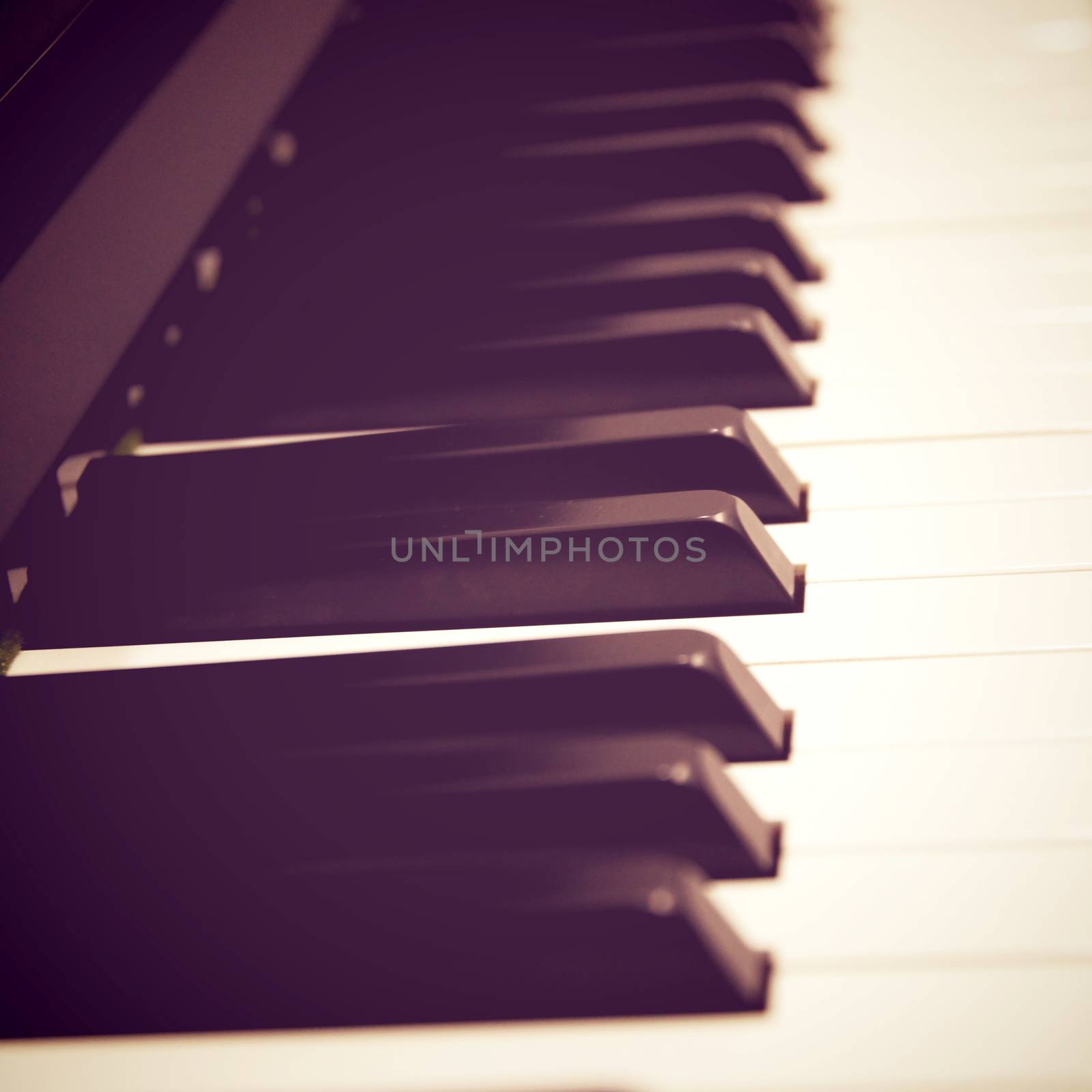 Close up of piano keys with retro filter effect