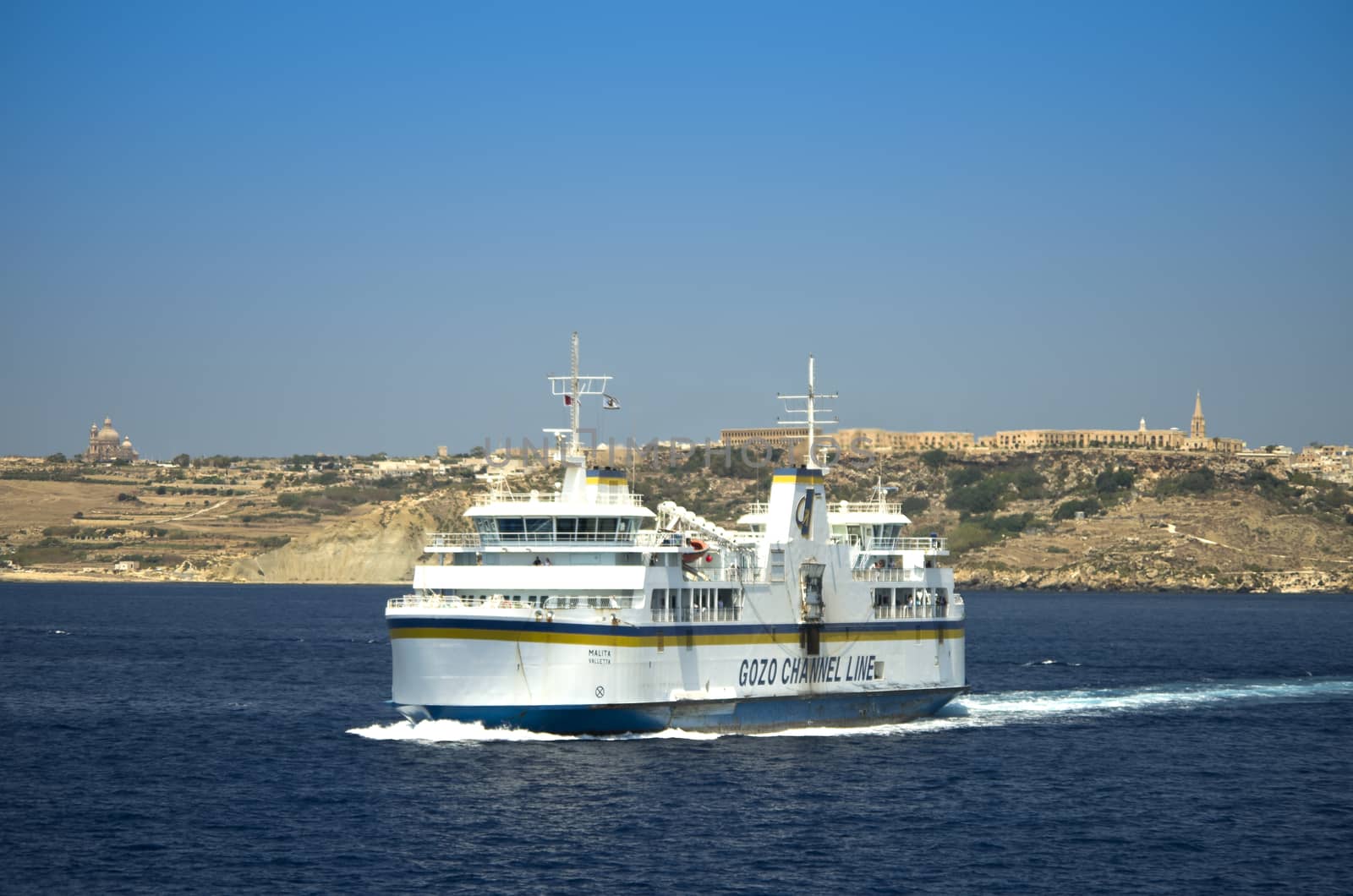 Gozo Channel Line's Malita car and passenger ferry cruising between Gozo and the mainland Malta - Gozo Channel, Malta