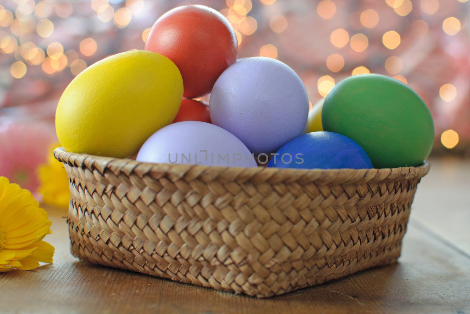 Easter eggs inside a wicker basket 