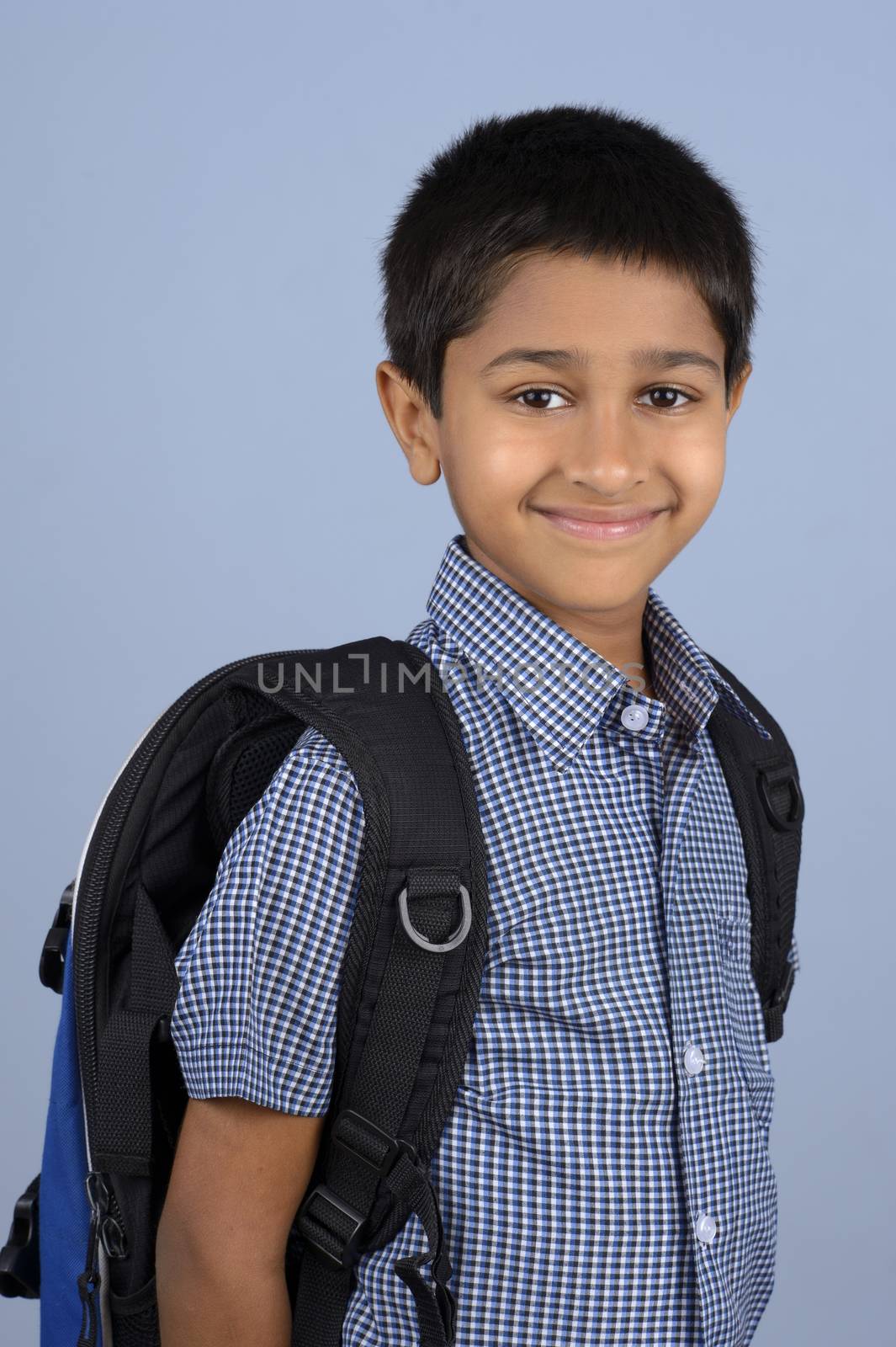 Handsome Indian toddler ready to go to school