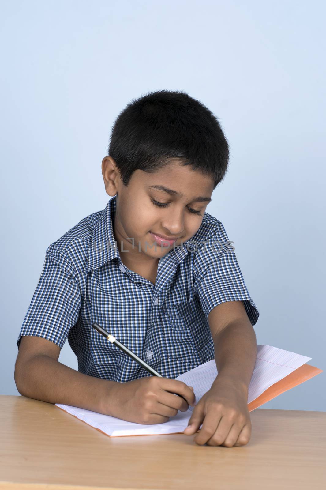 Handsome Indian toddler ready to go to school