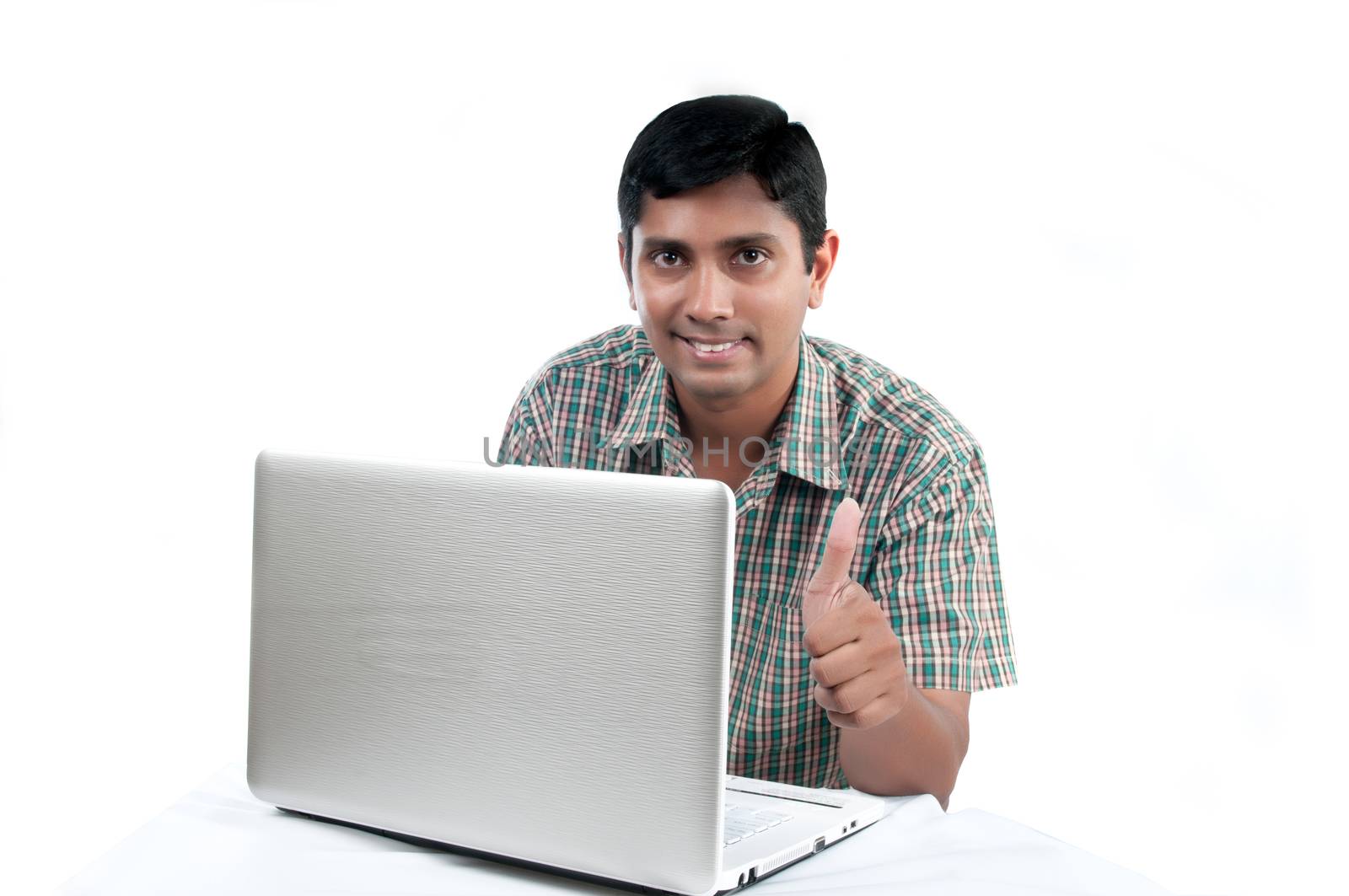 an old Indian man surfing the net after retirement