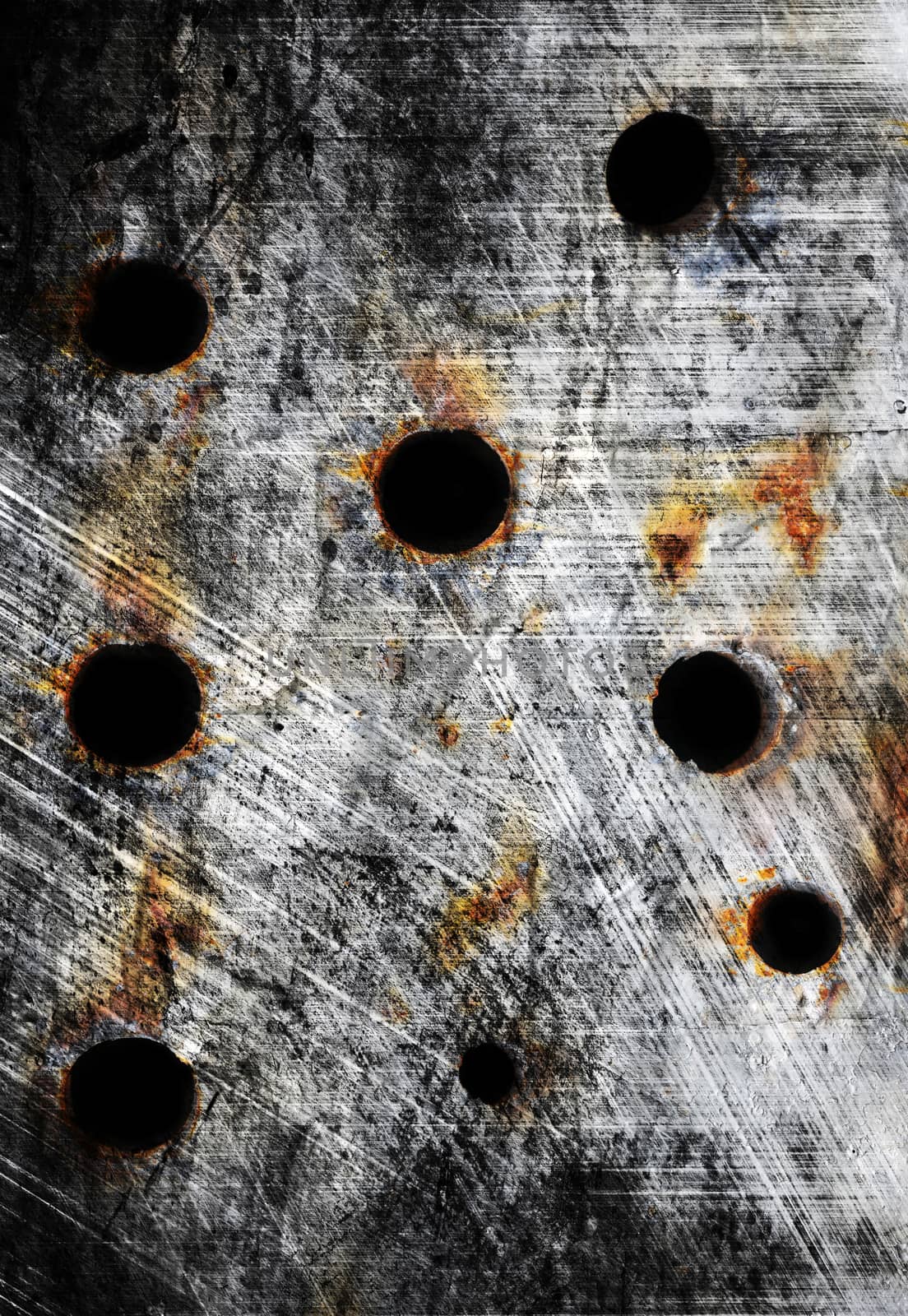 Old silver metal plate with bullet holes