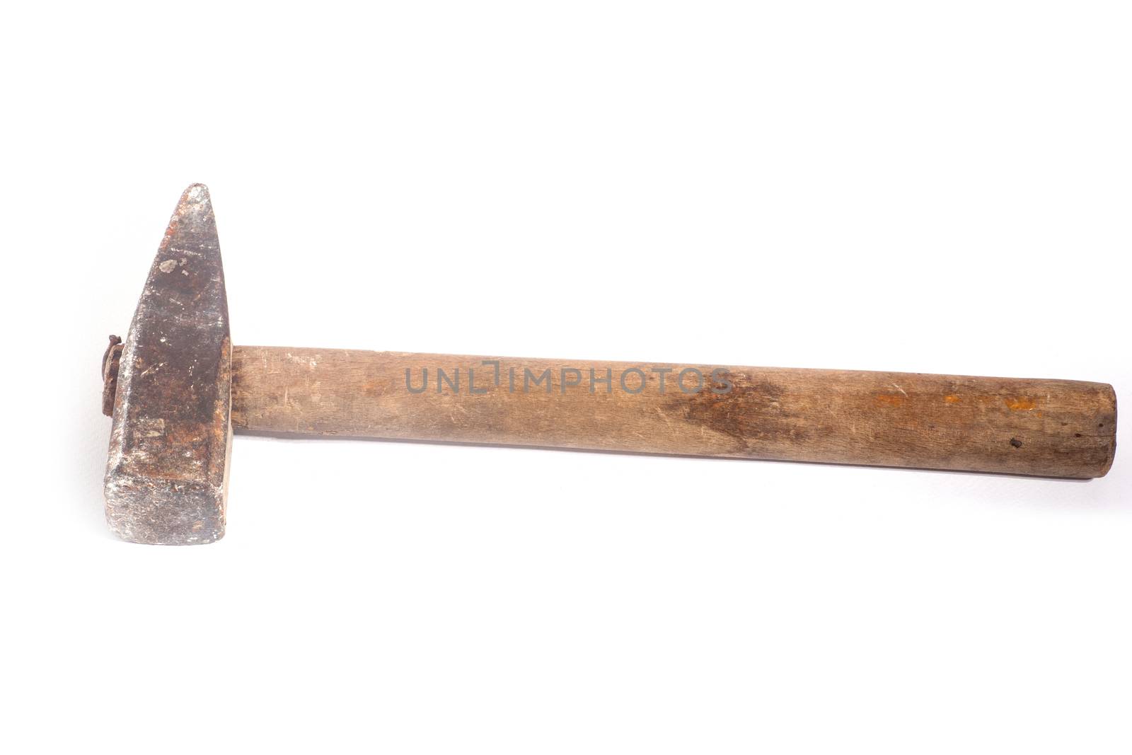 Close up of dirty hammer on white