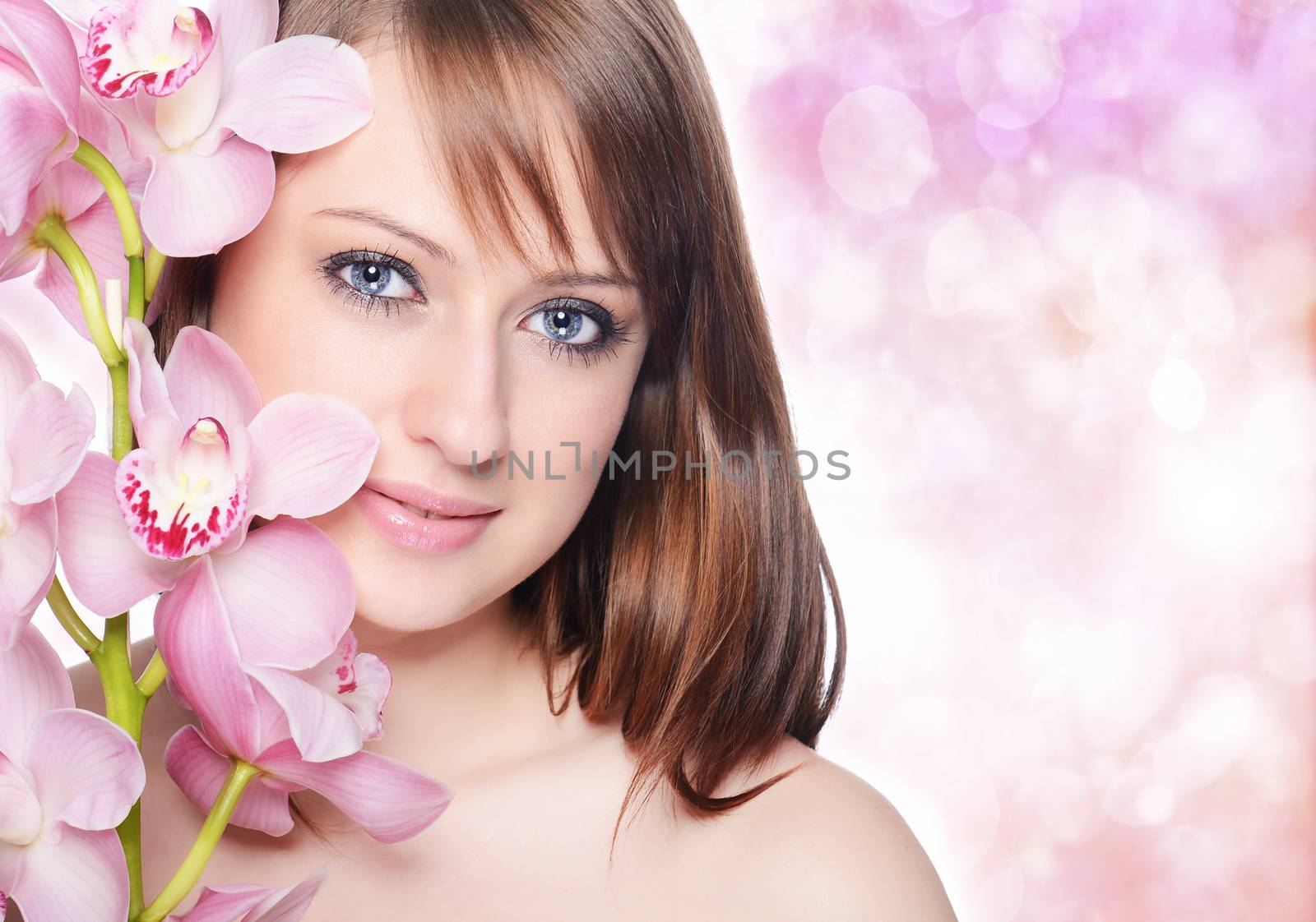 Beautiful Girl With Orchid Flowers