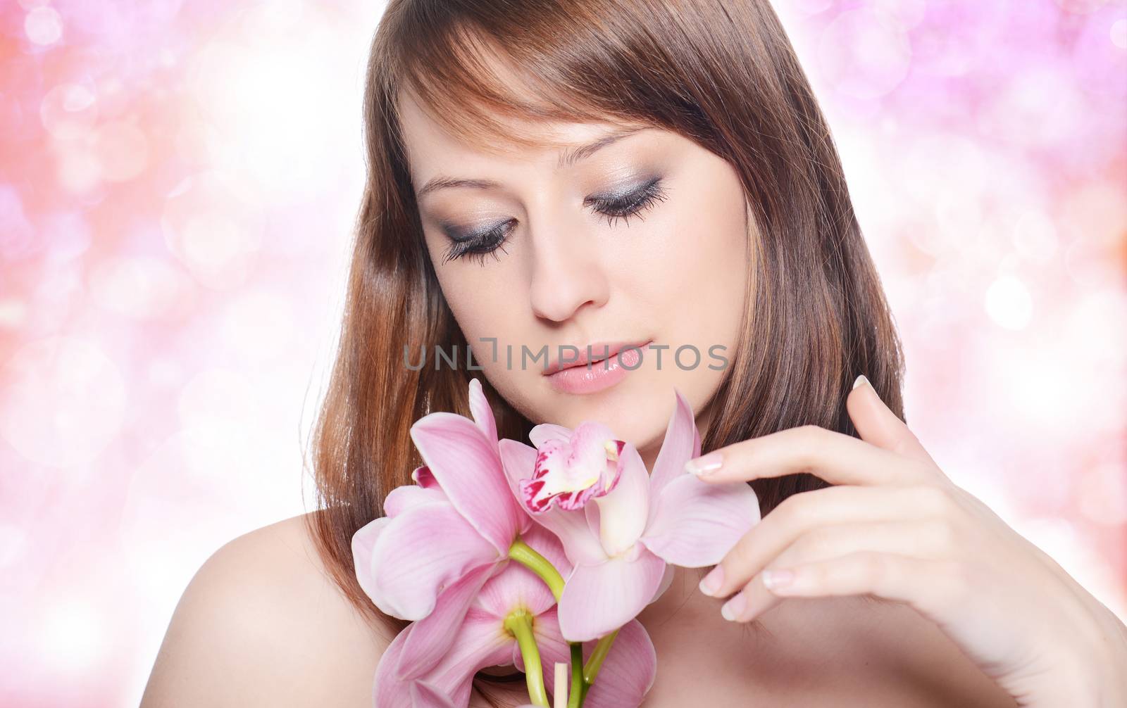 Beautiful Girl With Orchid Flowers