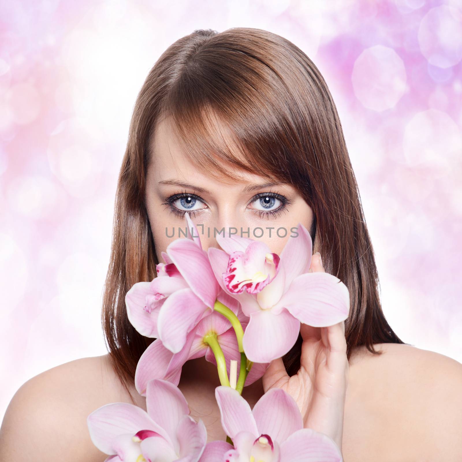 Beautiful Girl With Orchid Flowers