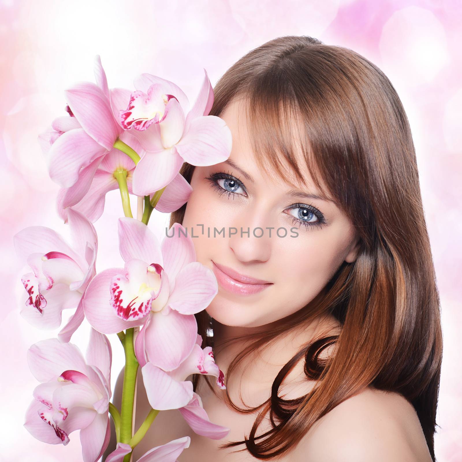 Beautiful Girl With Orchid Flowers