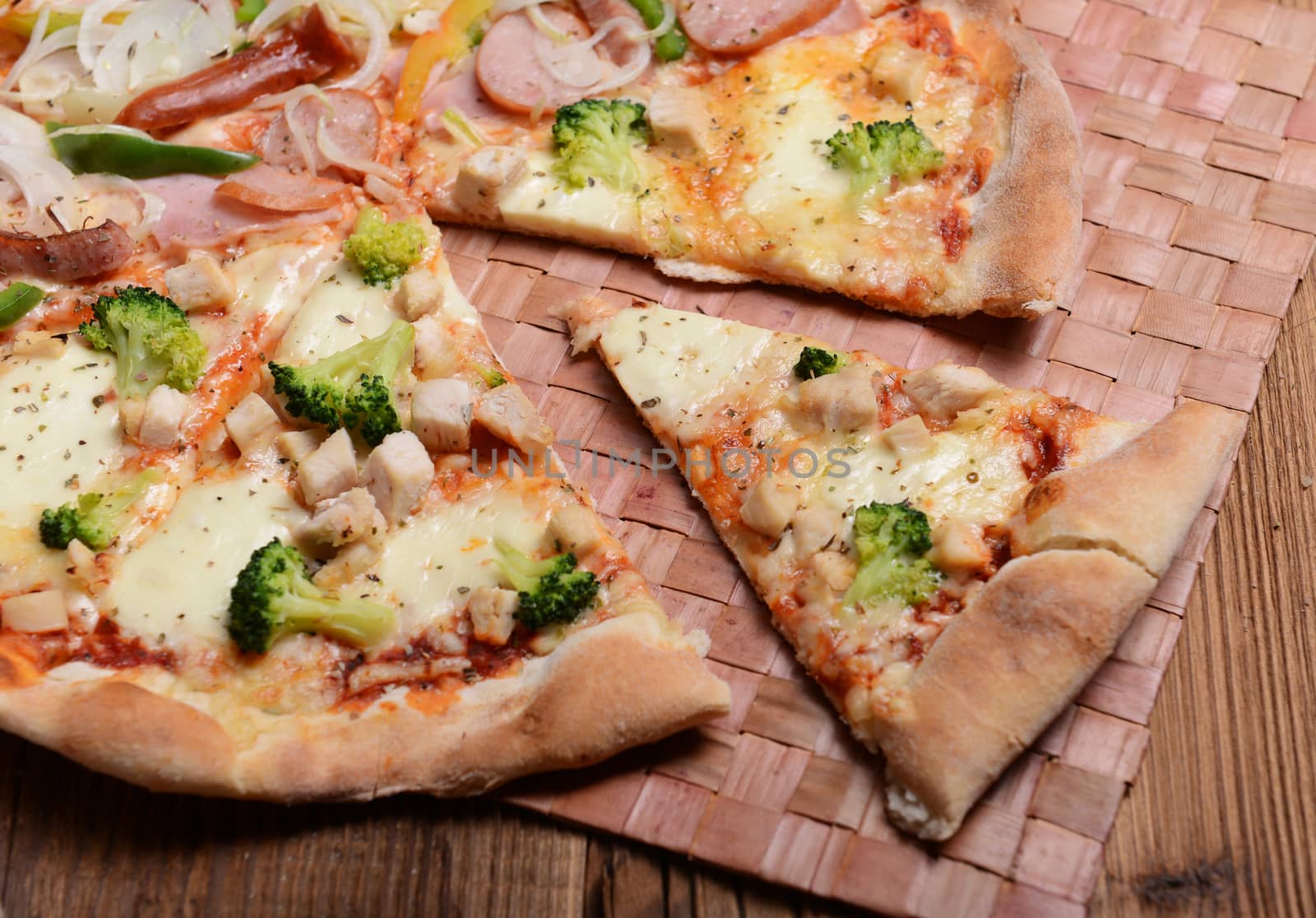 Tasty pizza with broccoli on old wooden background