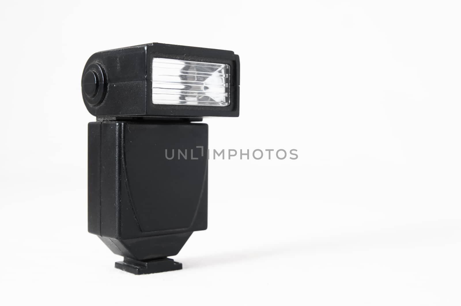 Black Photo Camera Flash on a White Background