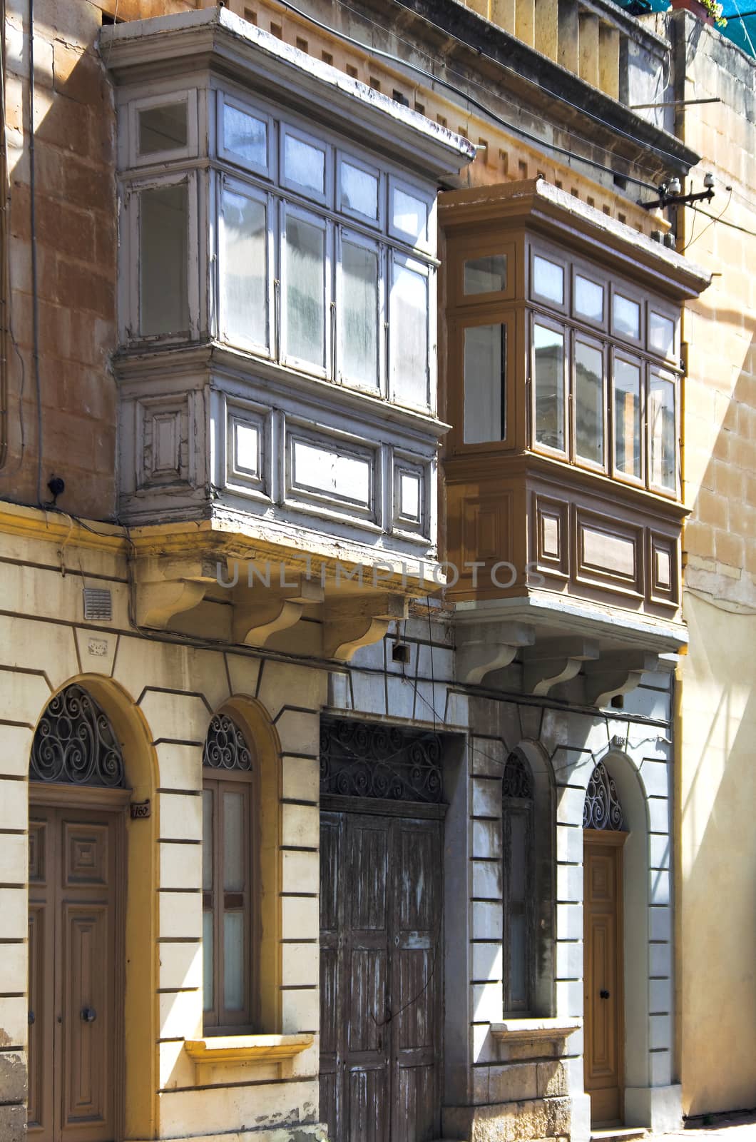 Traditional closed wooden balconies in St Paul's Bay - San Pawl il-Baħar, Malta