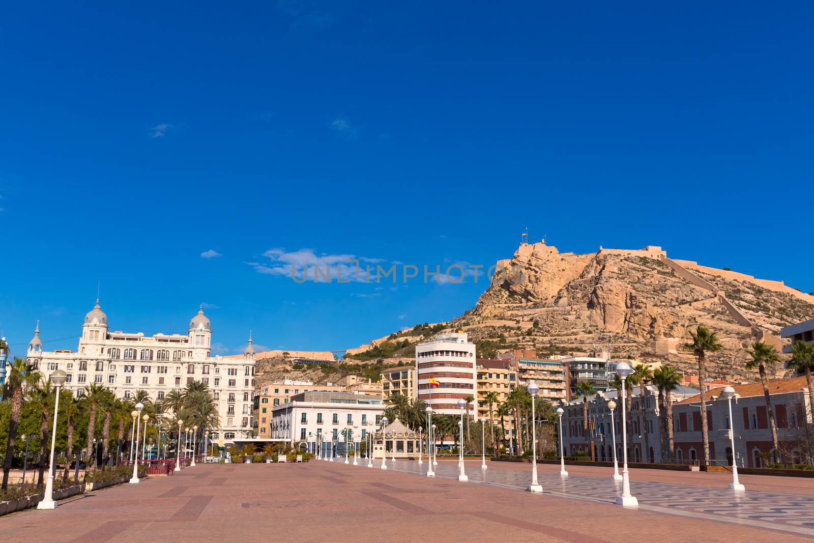 Alicante city and castle from port in Mediterranean spain by lunamarina