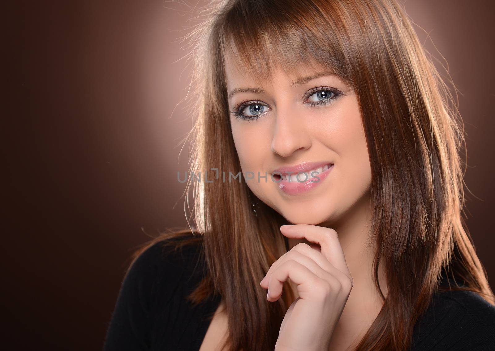 Beautiful Girl on brown background