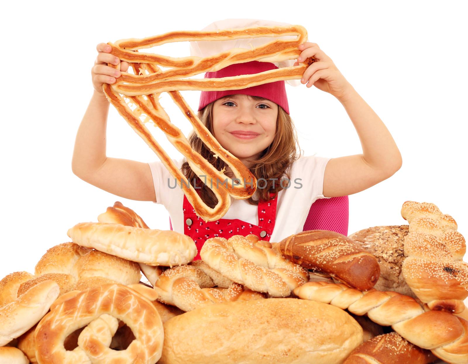 beautiful little girl cook with bread