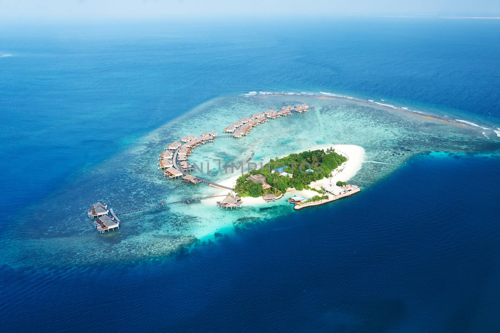 Group of atolls and islands in Maldives from aerial view