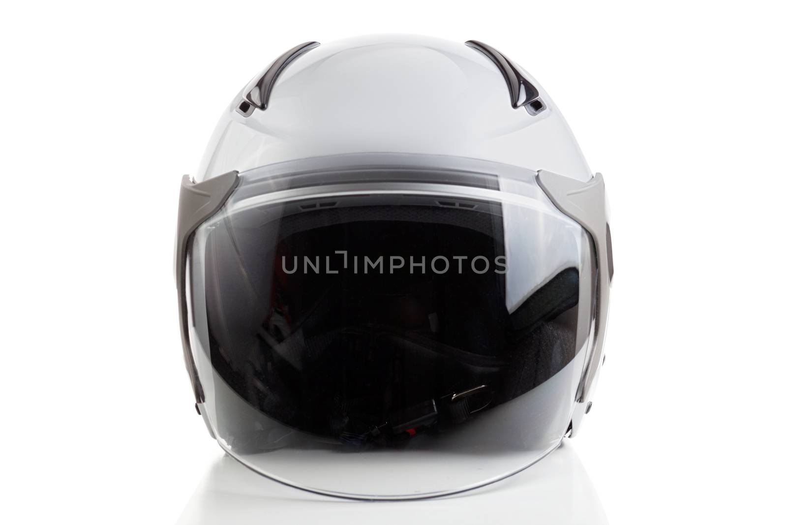 Glossy white motorcycle helmet isolated on background