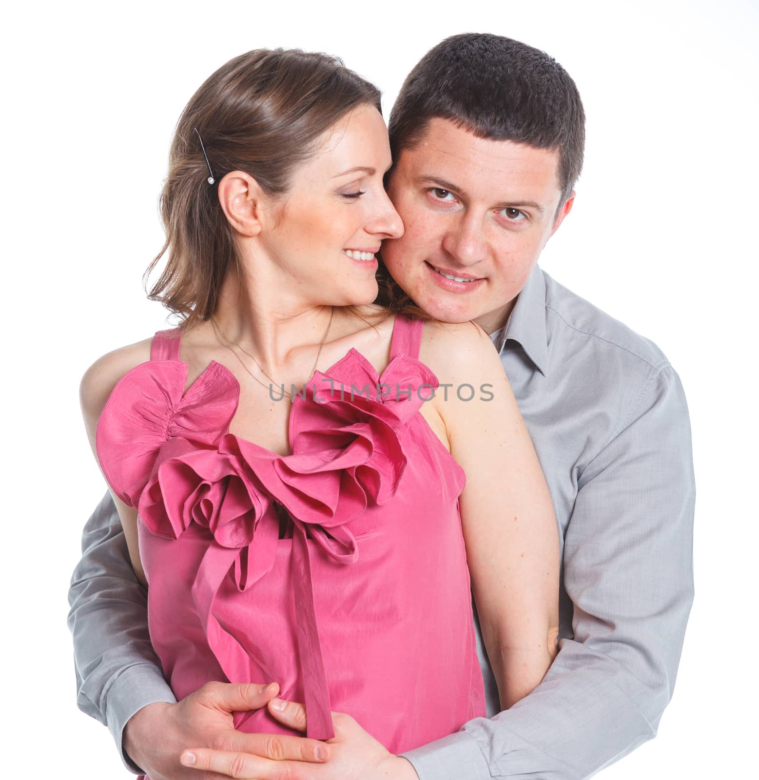 Portrait of happy couple. Attractive man and woman being playful. Isolated on white background.