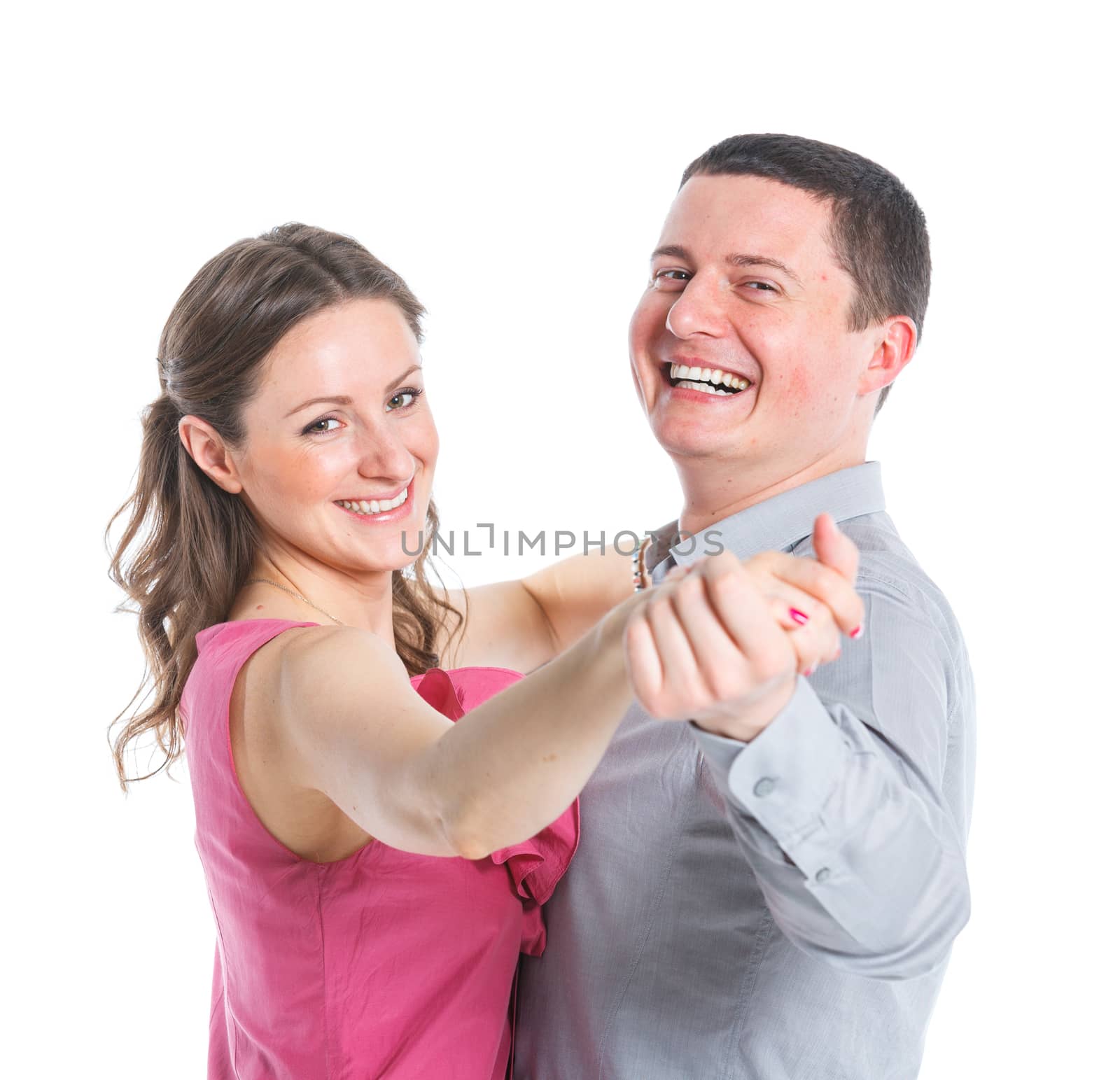 Portrait of happy couple. Attractive man and woman being playful. Isolated on white background.