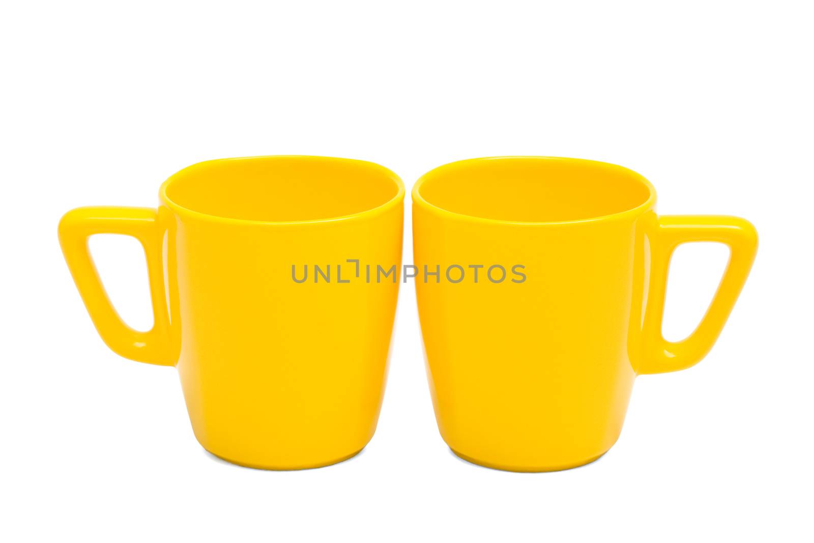 two yellow mug on a white background