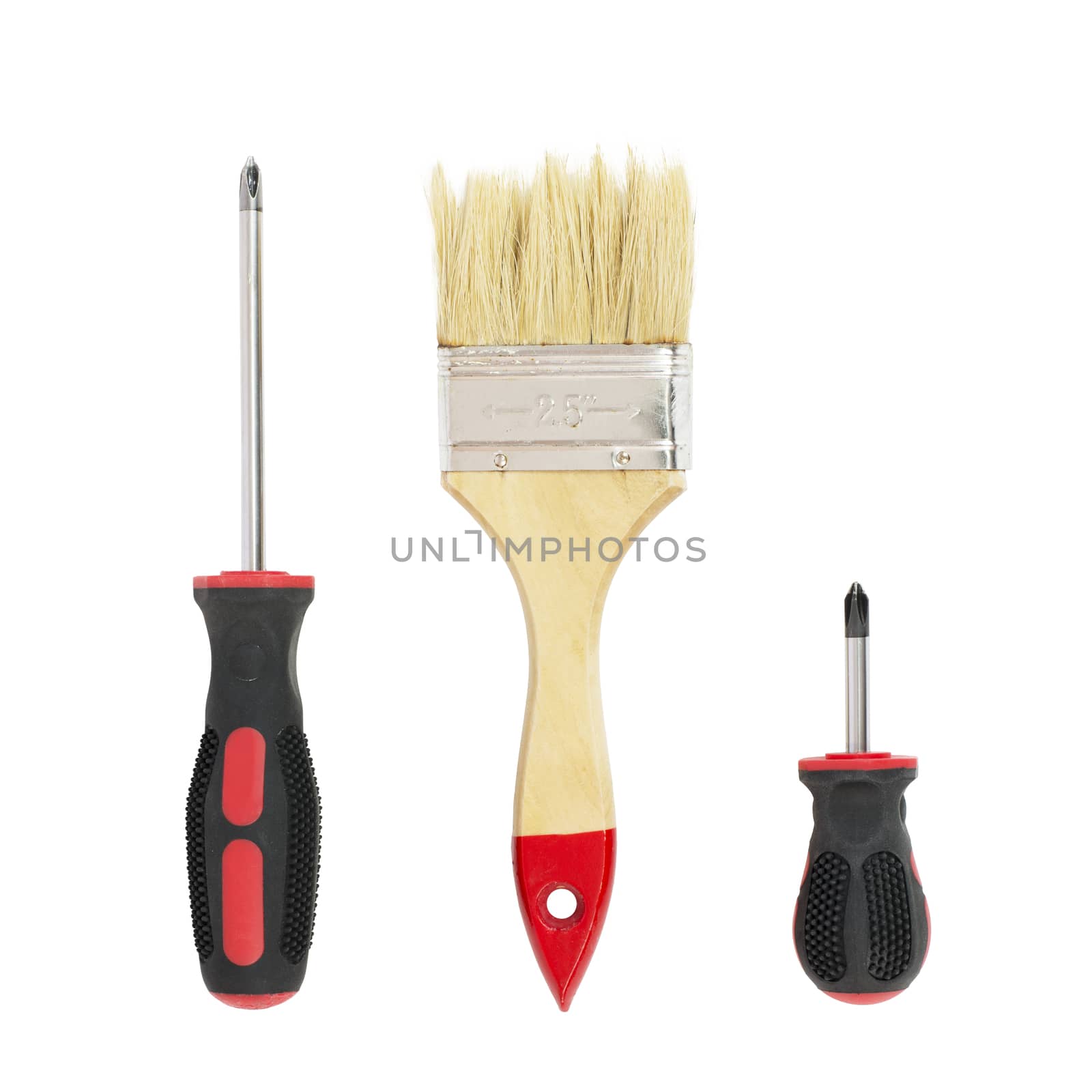 Two screwdrivers and a brush. Isolated on white background