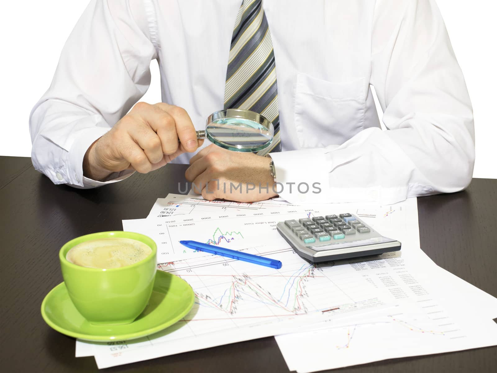 Businessman holding magnifying glass by cherezoff