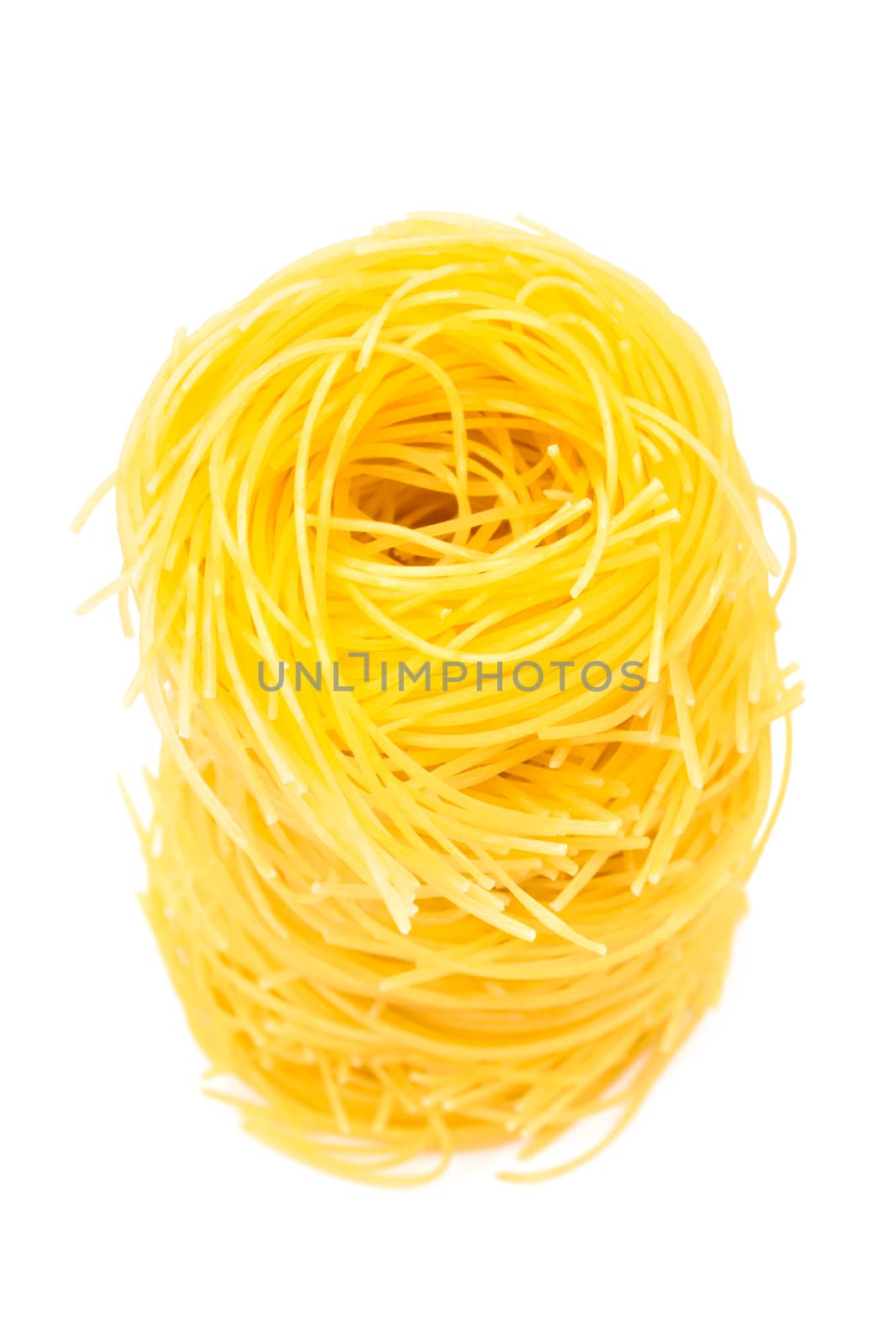 Different beautiful pasta on a white background