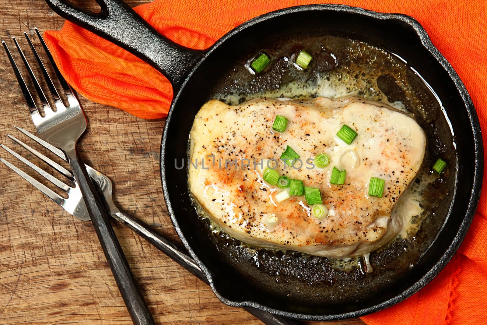 Oven Baked Swordfish in Butter with Green Onions and Ginger Top View Over White