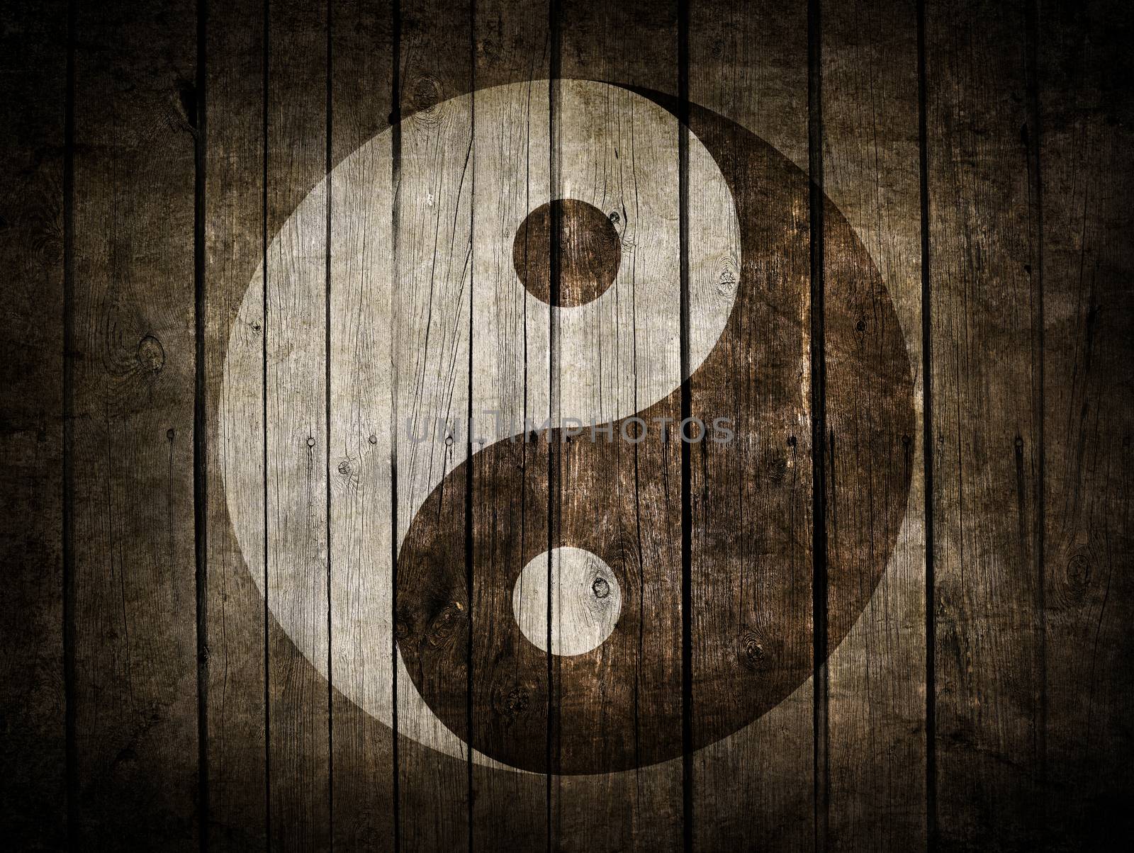The Ying Yang sign painted on wooden wall