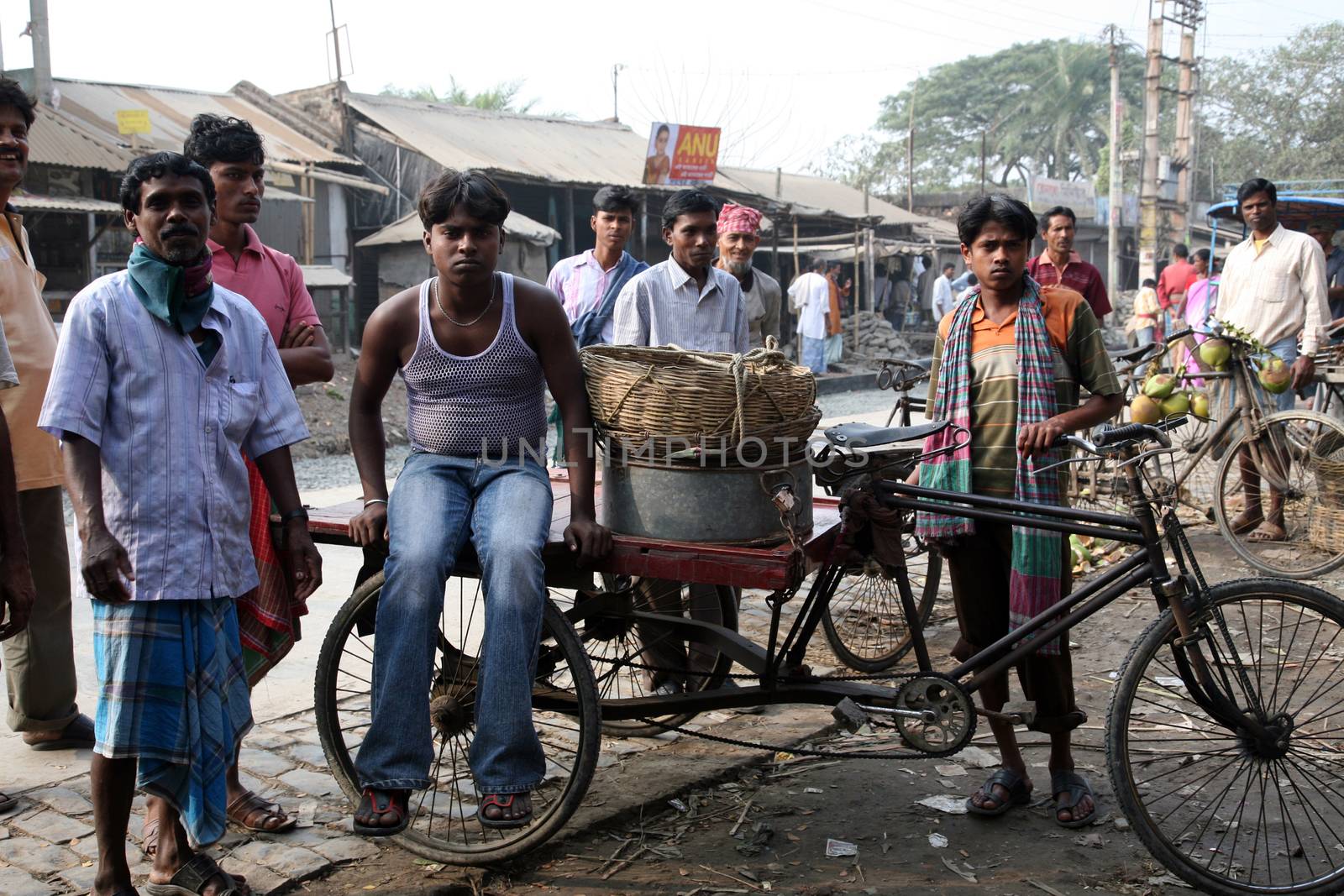 People on market in Kumrokhali, West Bengal, India, January 12, 2009. The people usually suspend all their routine work on the market day and attend the market, many with their family members and friends. These markets become the central points for socio-cultural activities.