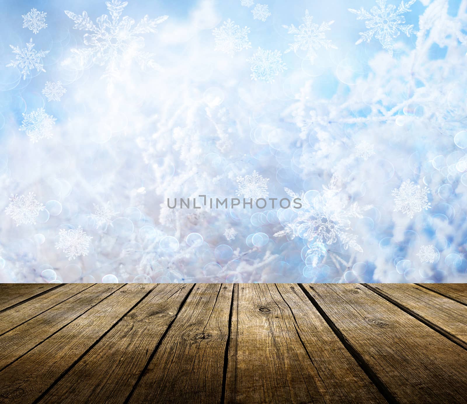 Empty wooden deck table with winter background. Ready for product display montage. 