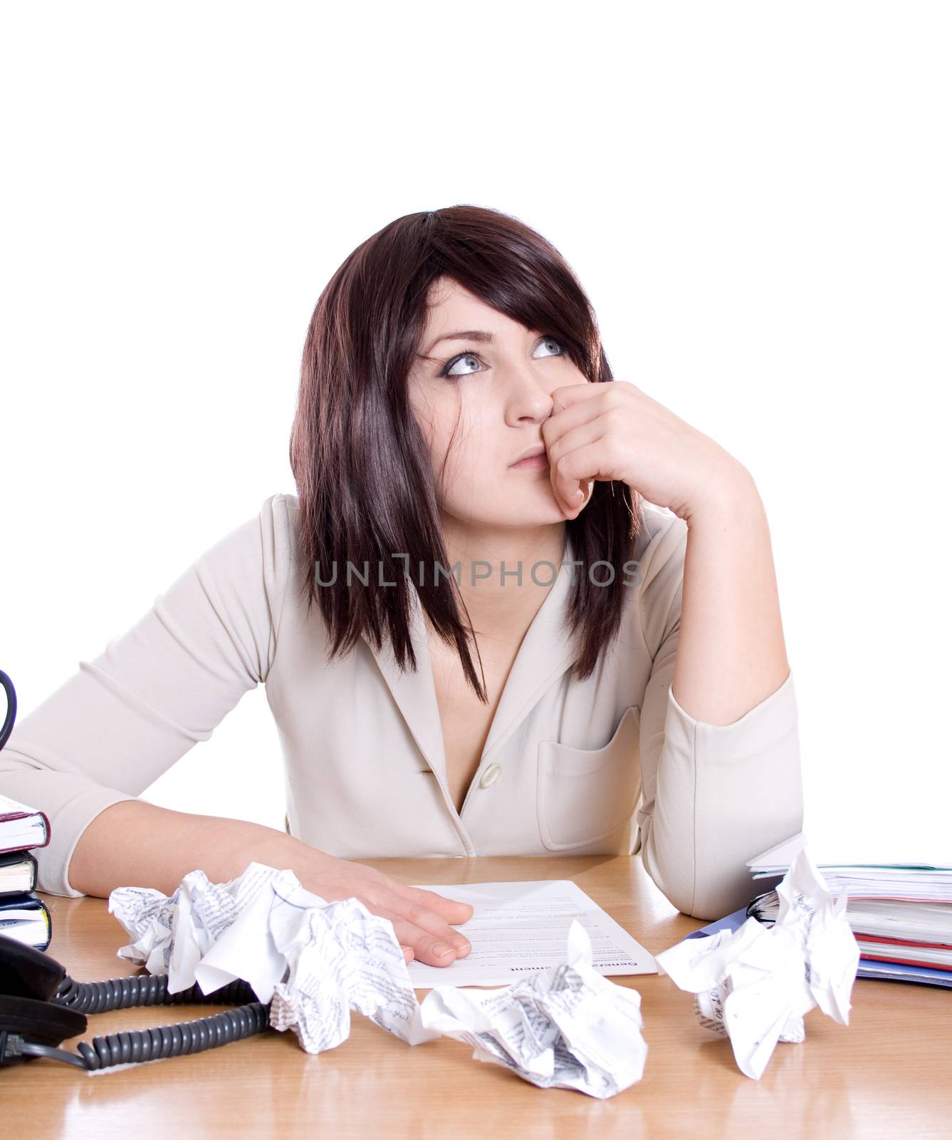 Stressed business woman with stack of paperwork, pile of crumpled papers isolated