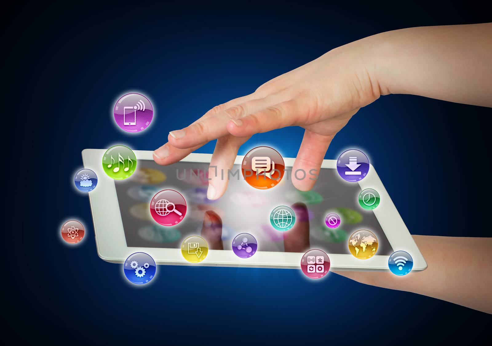 Hands holding tablet pc and application icons. The concept of software