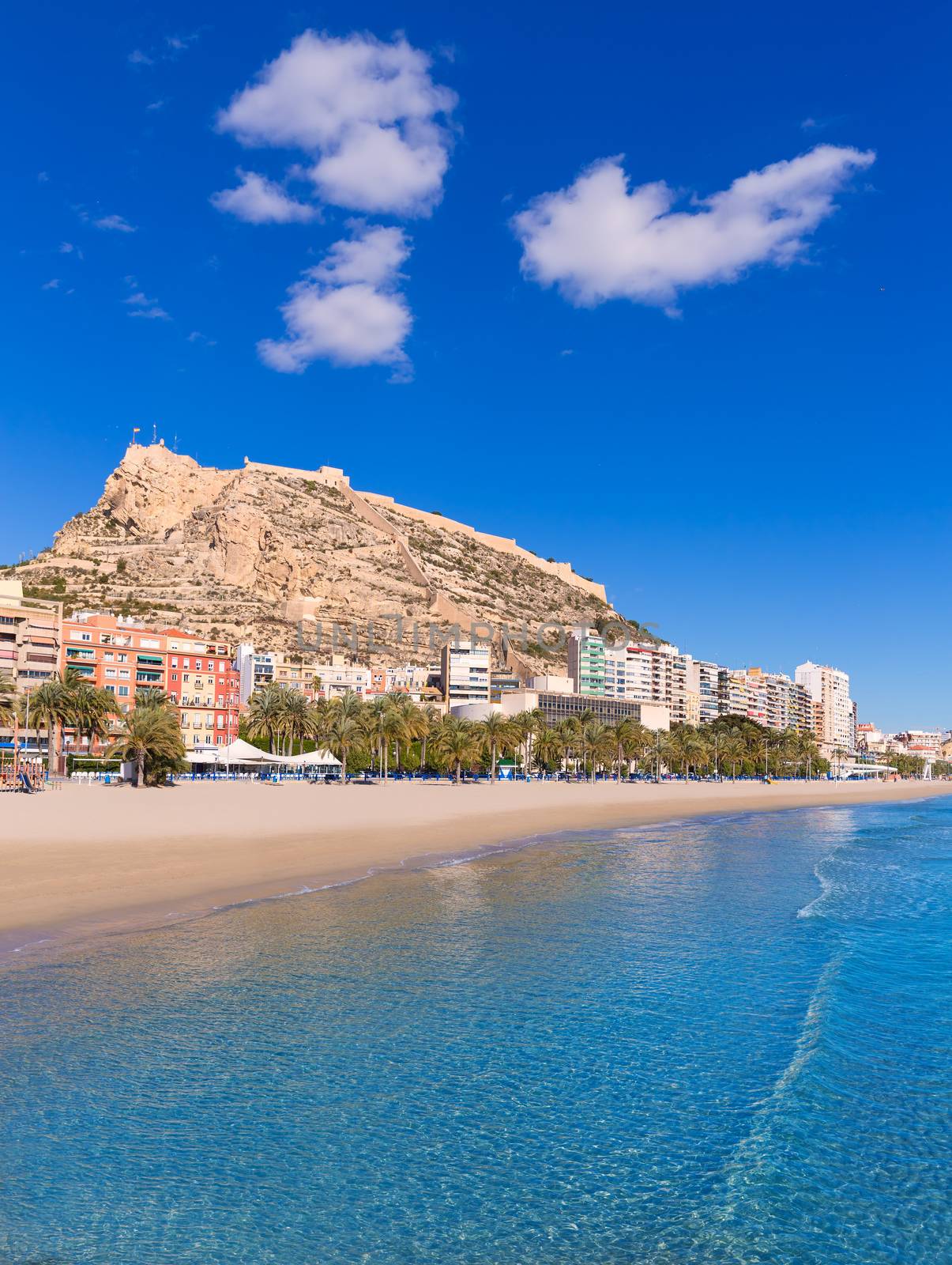 Alicante Postiguet beach and castle Santa Barbara in Spain by lunamarina