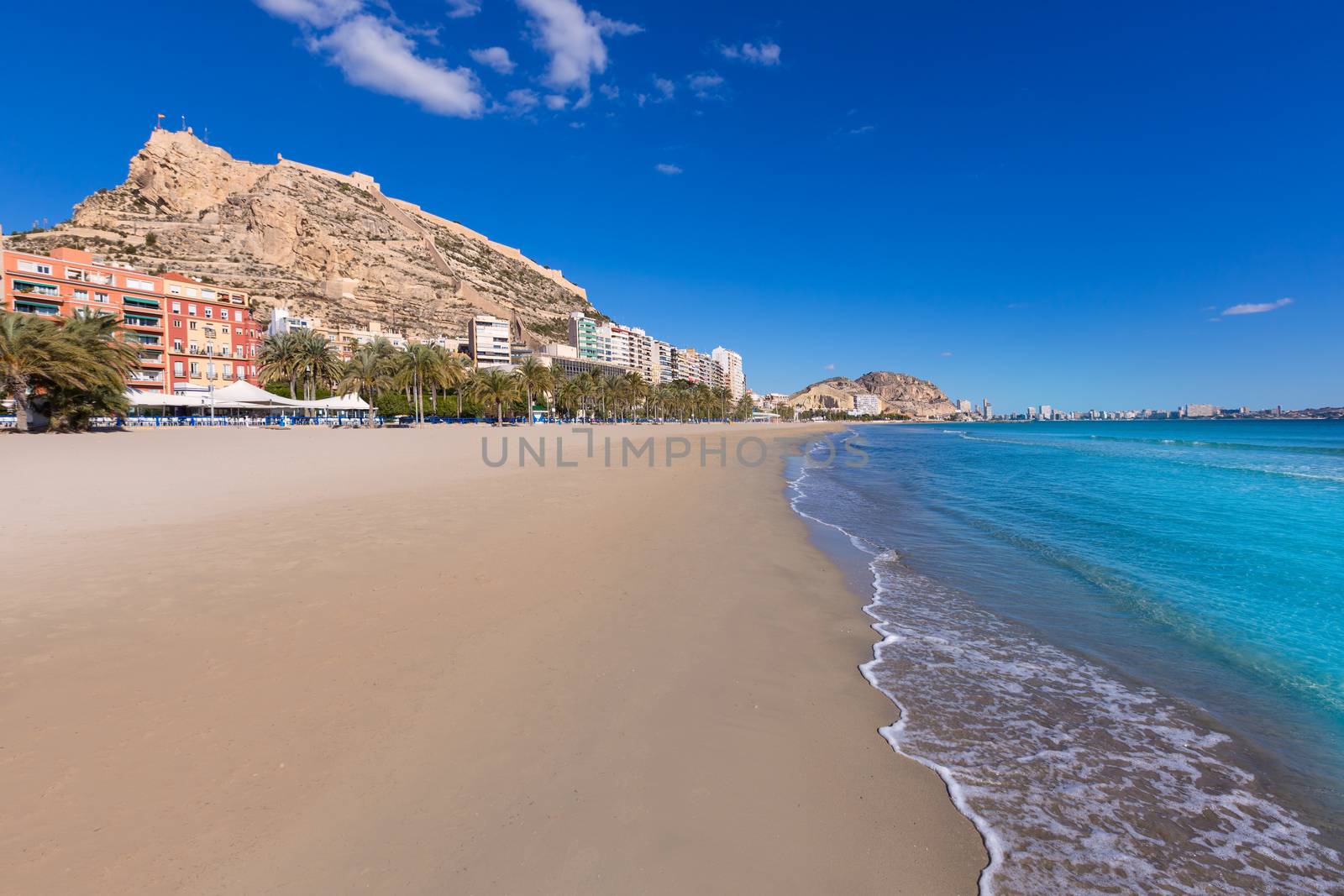 Alicante Postiguet beach and castle Santa Barbara in Spain by lunamarina