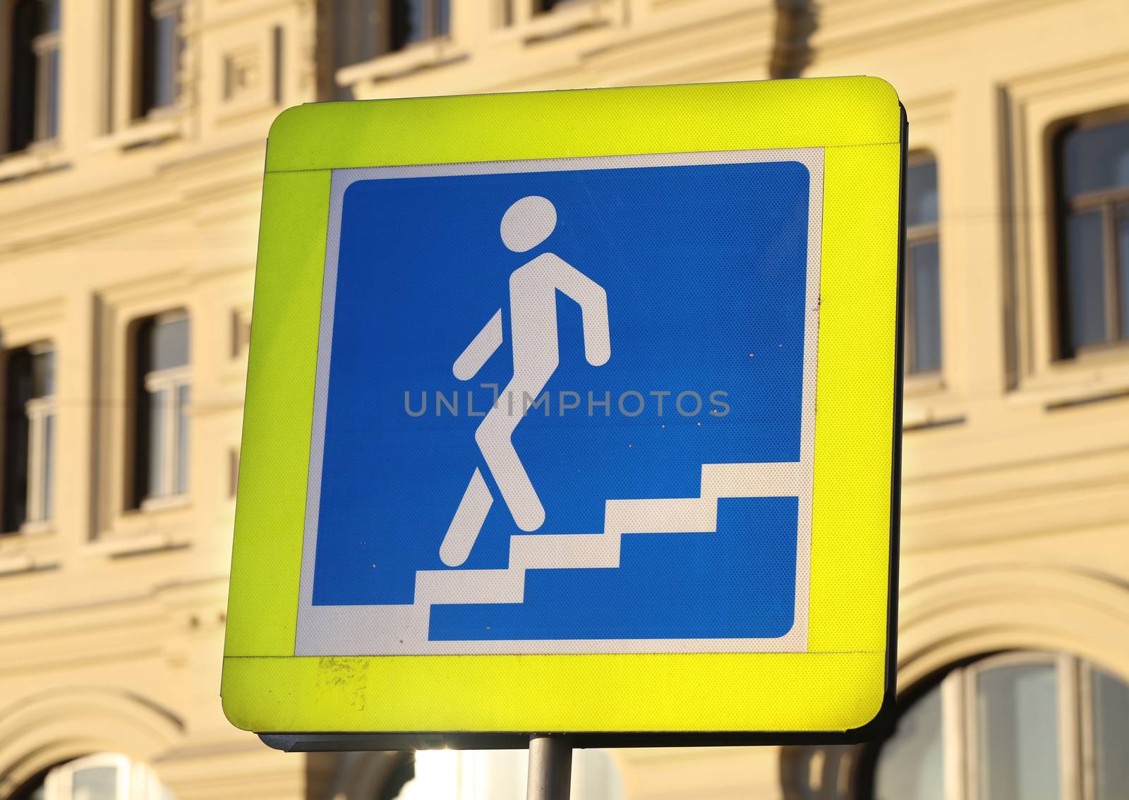 Road sign crosswalk on the building background