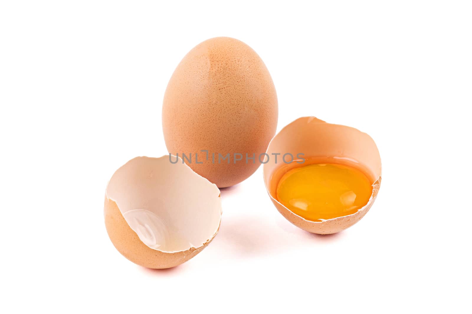 Chicken eggs with broken, on a white background