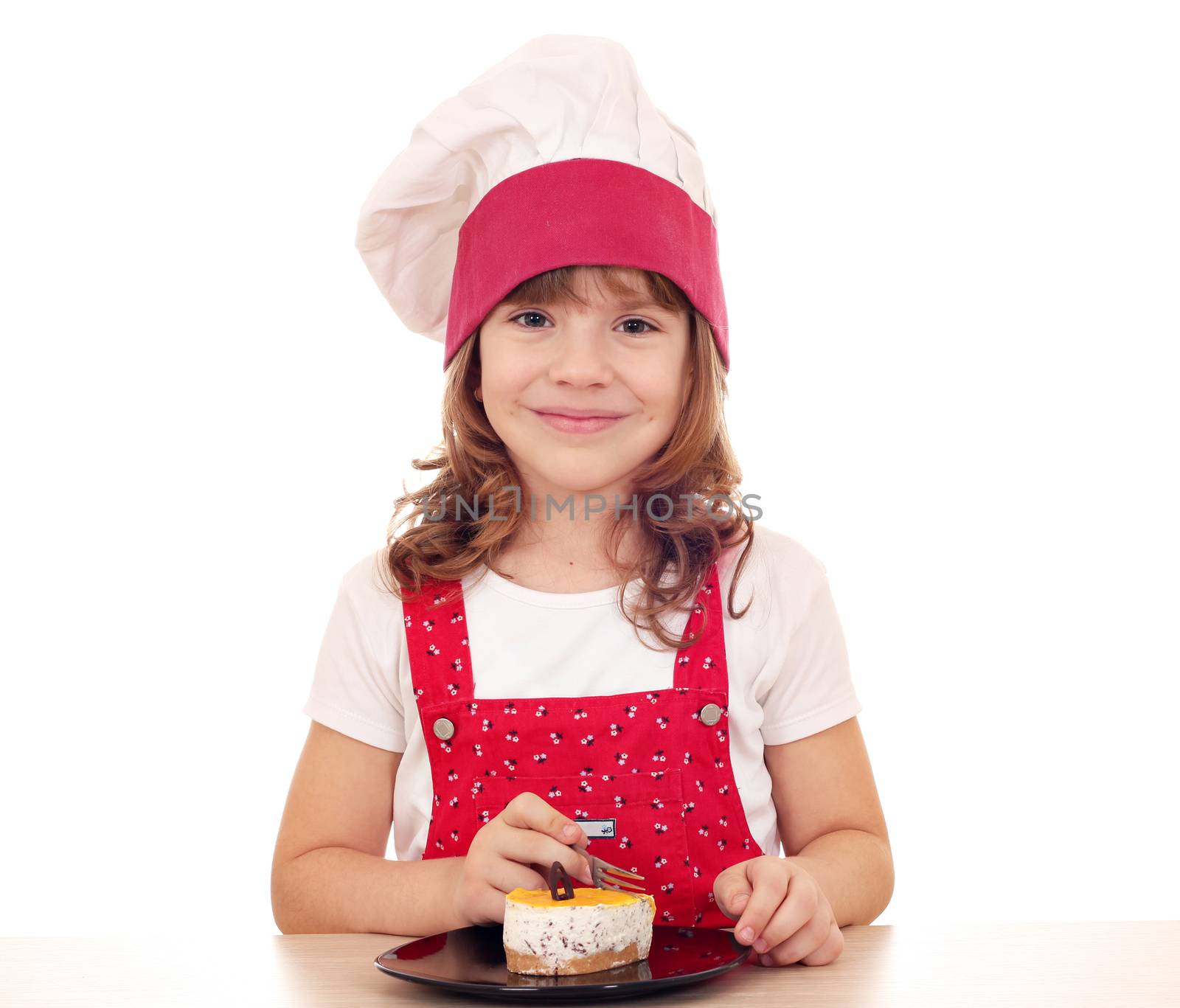 beautiful little girl cook eat cake by goce