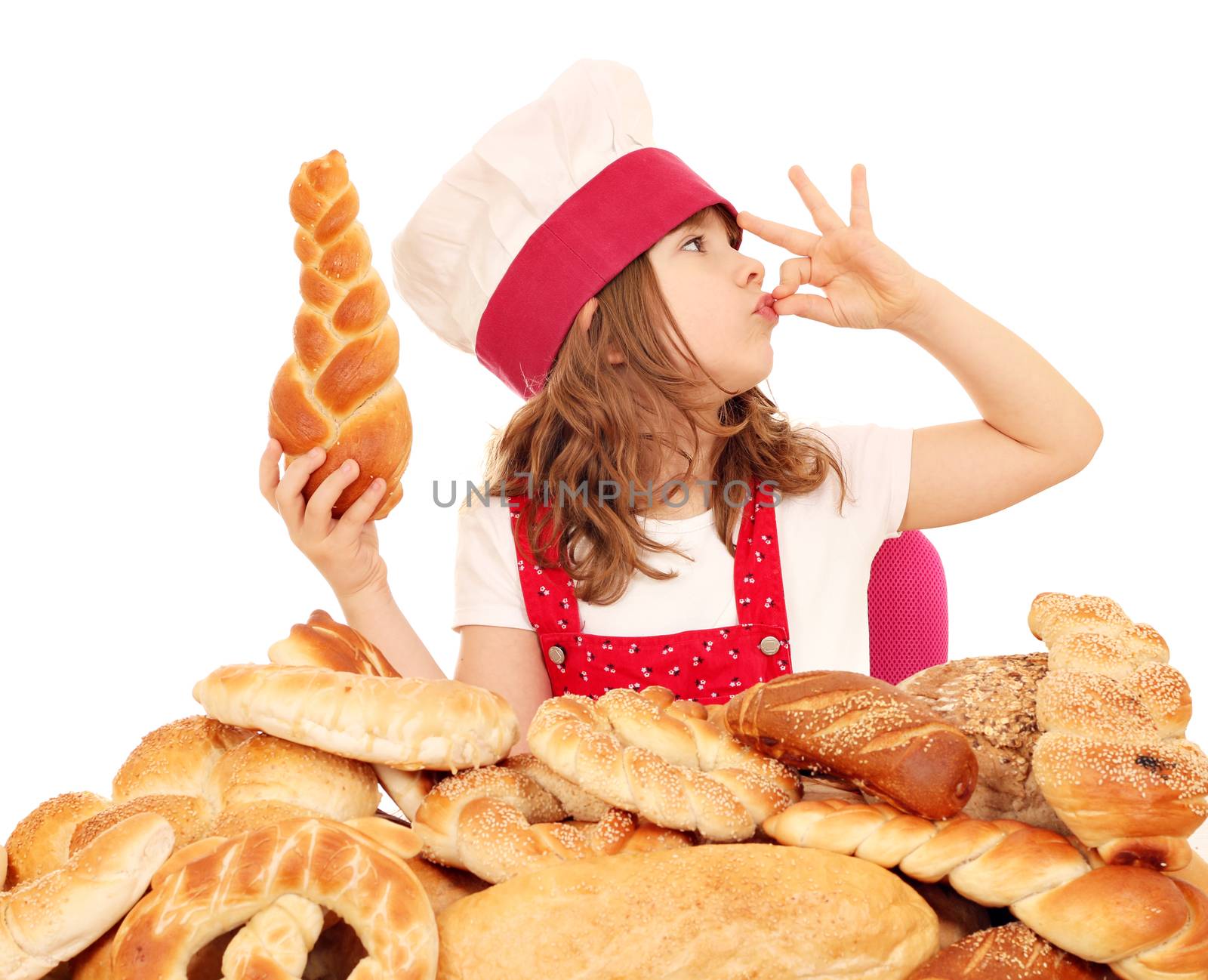 little girl cook with bread and ok hand sign by goce