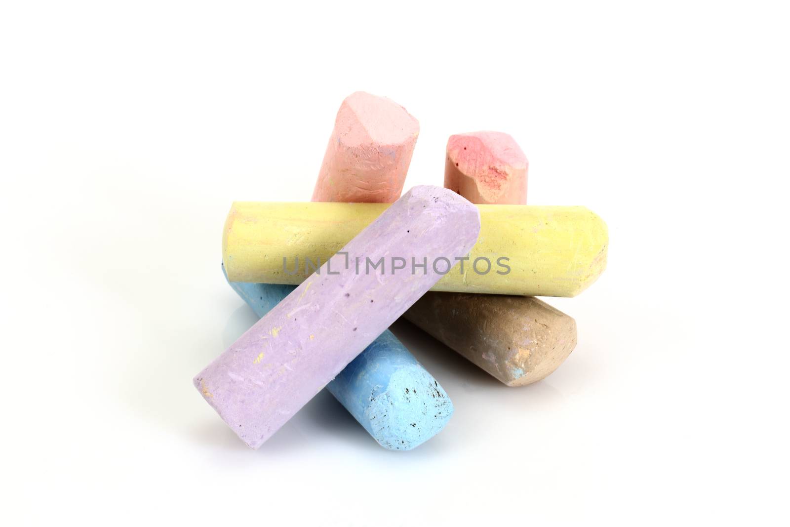 colored chalk for drawing on a white background