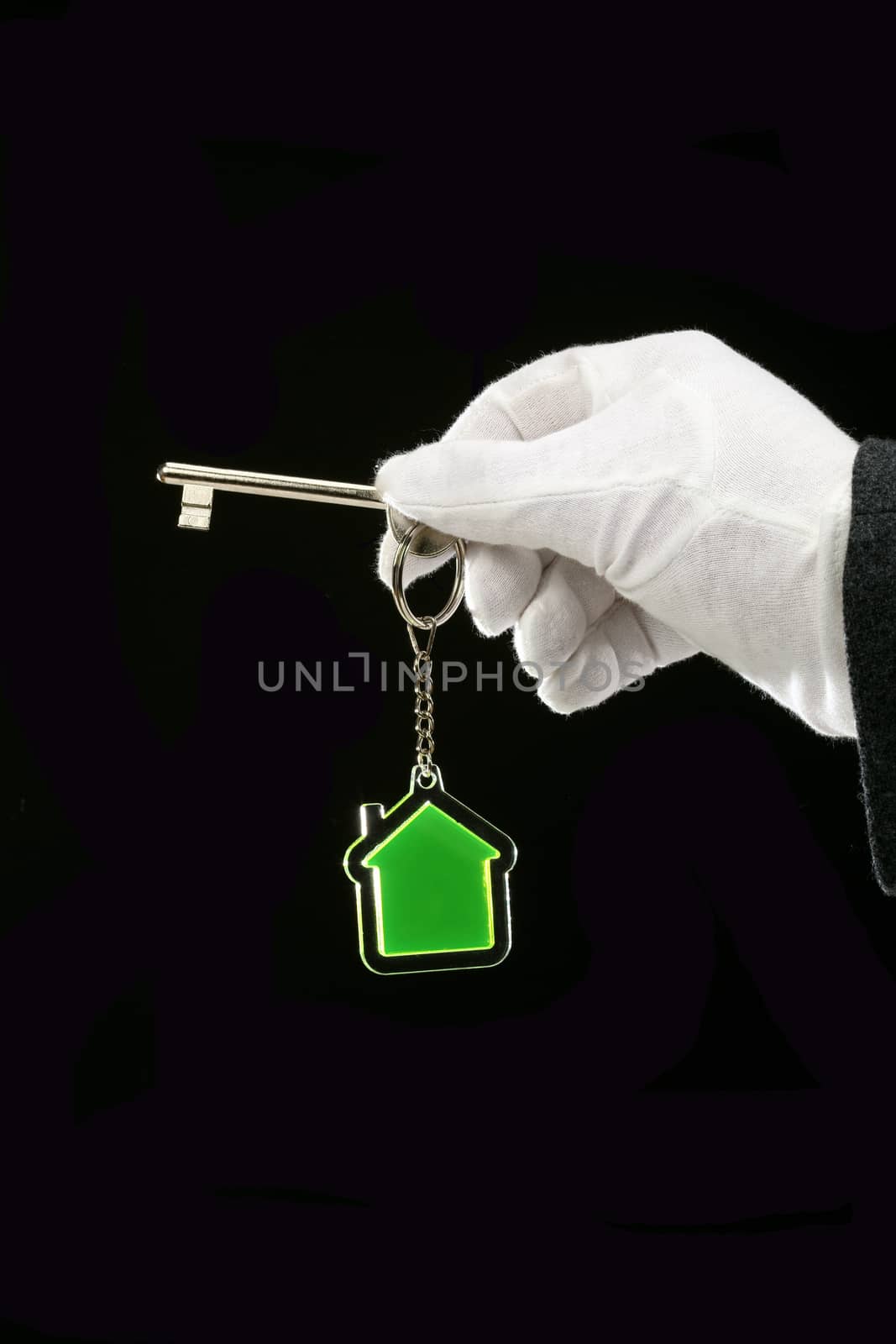 key and transparent key chain in the shape of House 