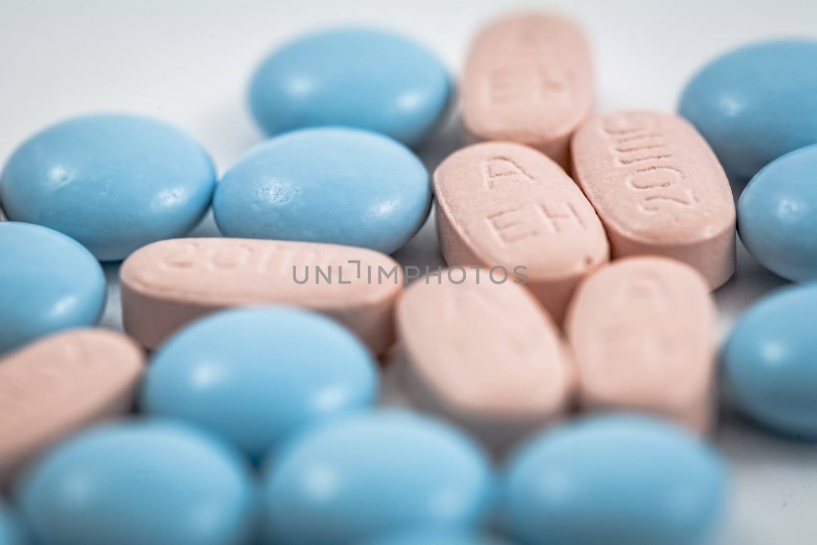 close up of medical pills isolated on white background by digicomphoto